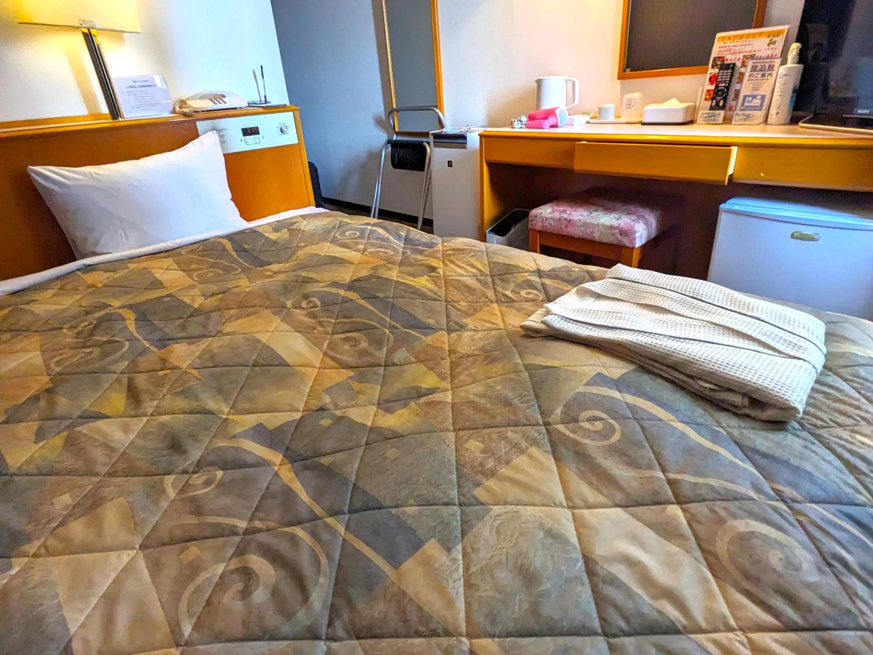 Bed in Plaza Hotel Nogata