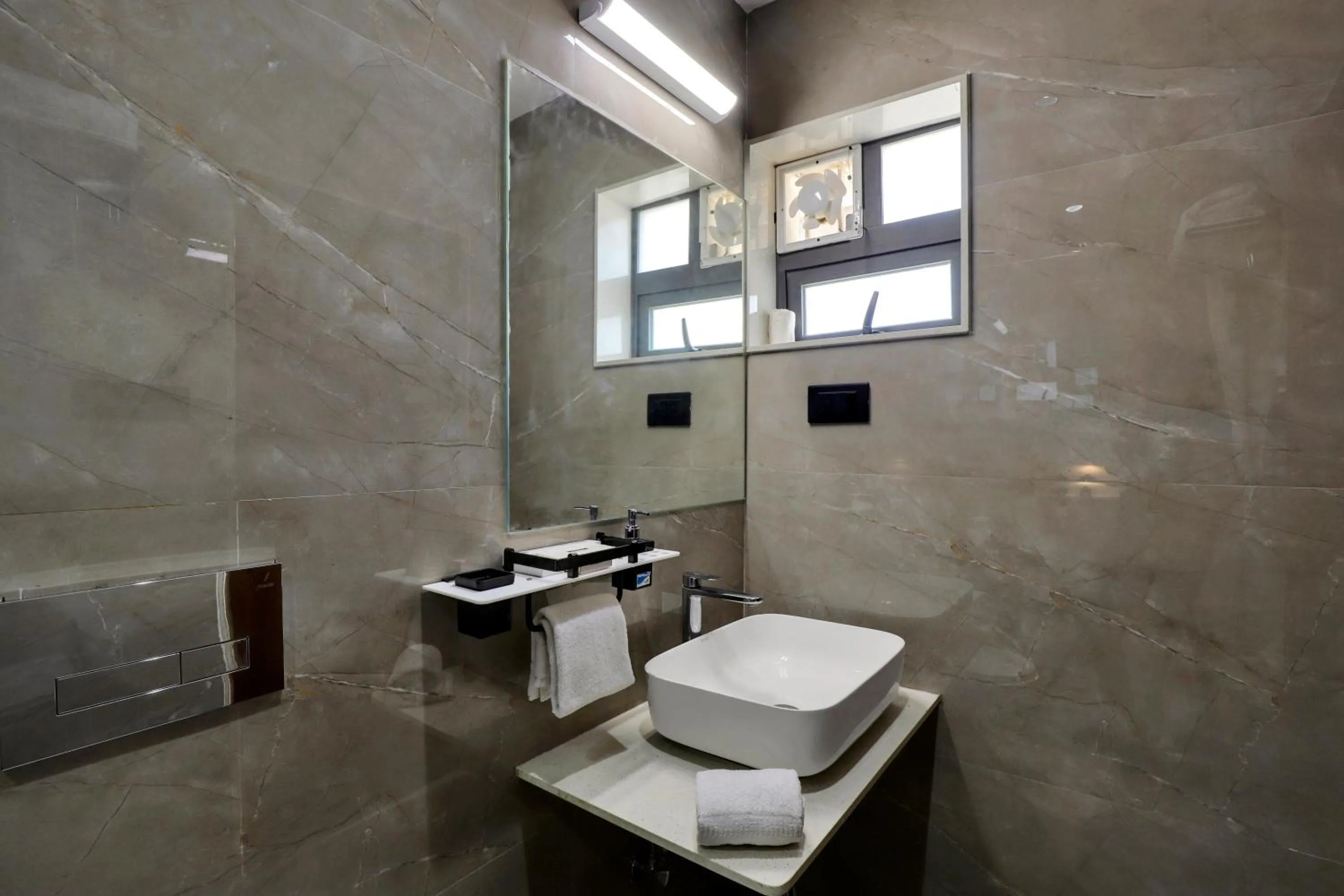 Bathroom in Goverdhan Greens Resort Dwarka l Hotels In Dwarka