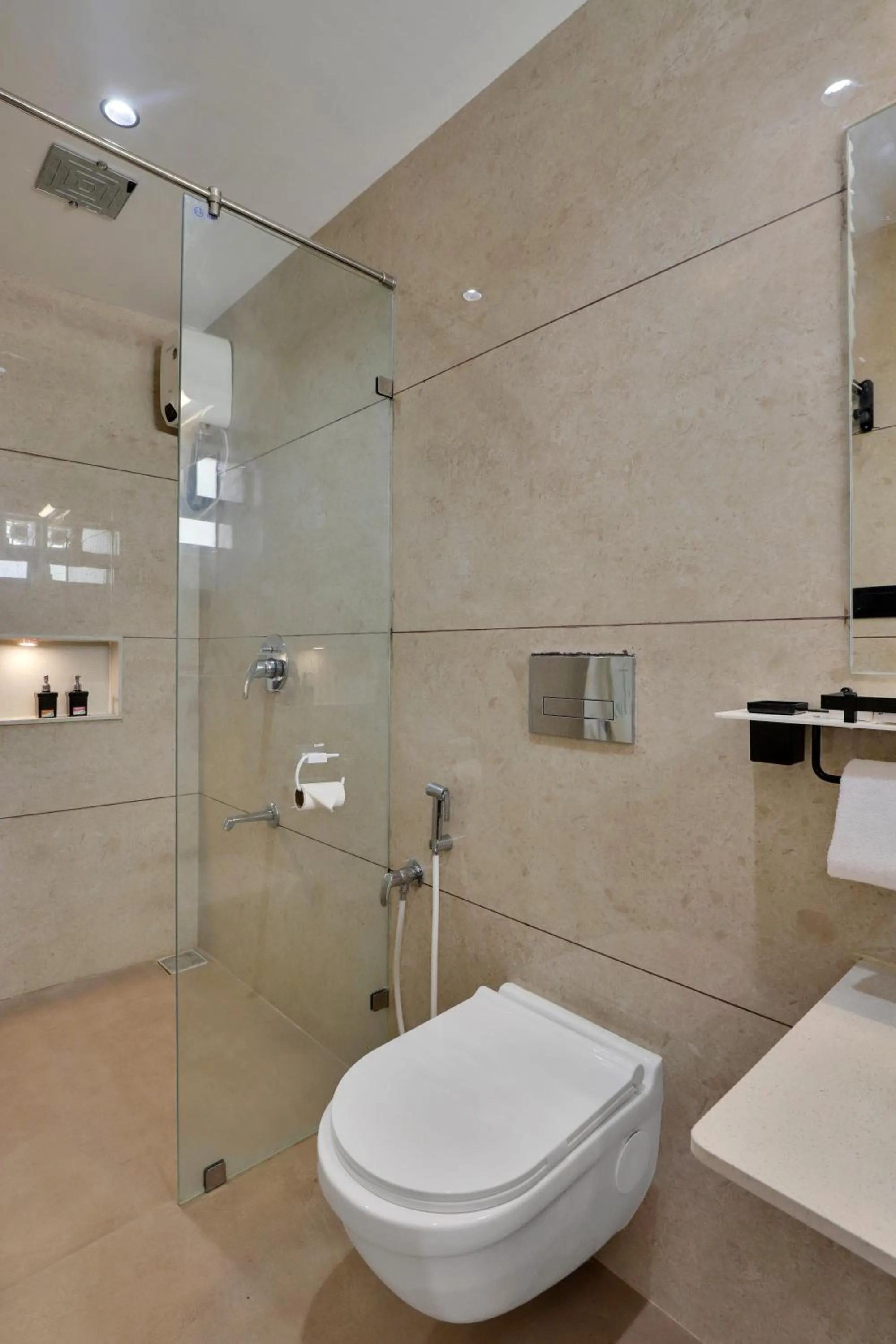 Shower in Goverdhan Greens Resort Dwarka l Hotels In Dwarka