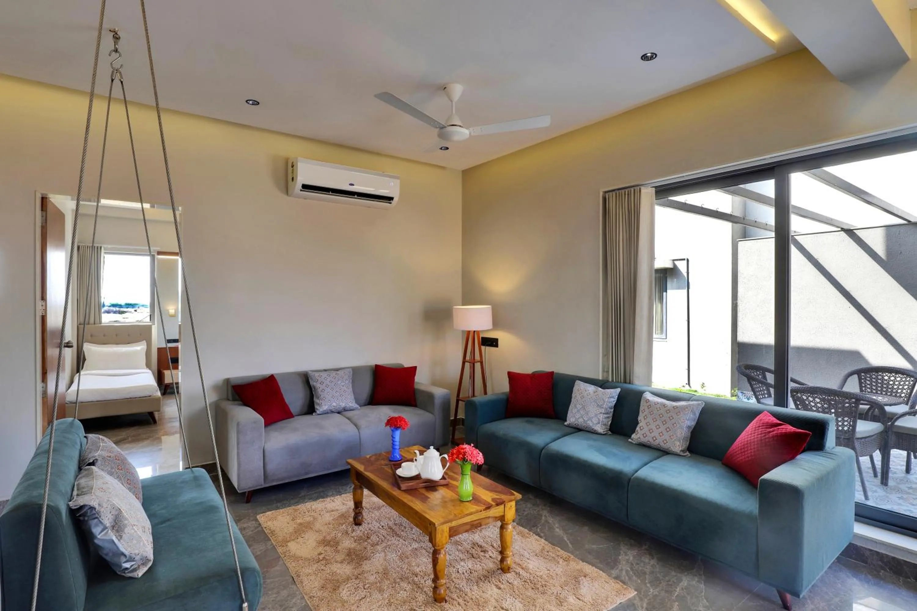 Living room in Goverdhan Greens Resort Dwarka l Hotels In Dwarka