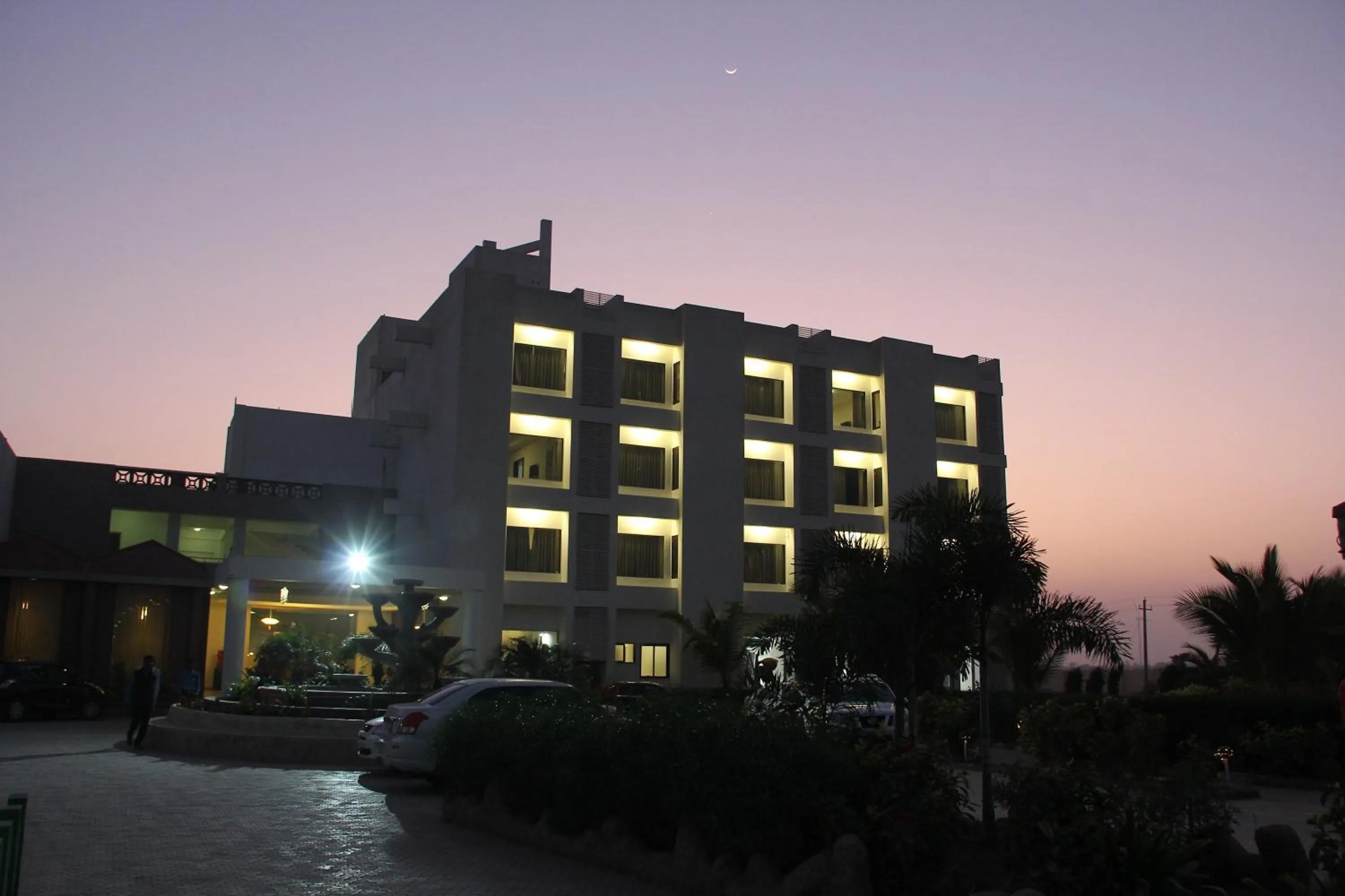 Property building in Goverdhan Greens Resort Dwarka l Hotels In Dwarka