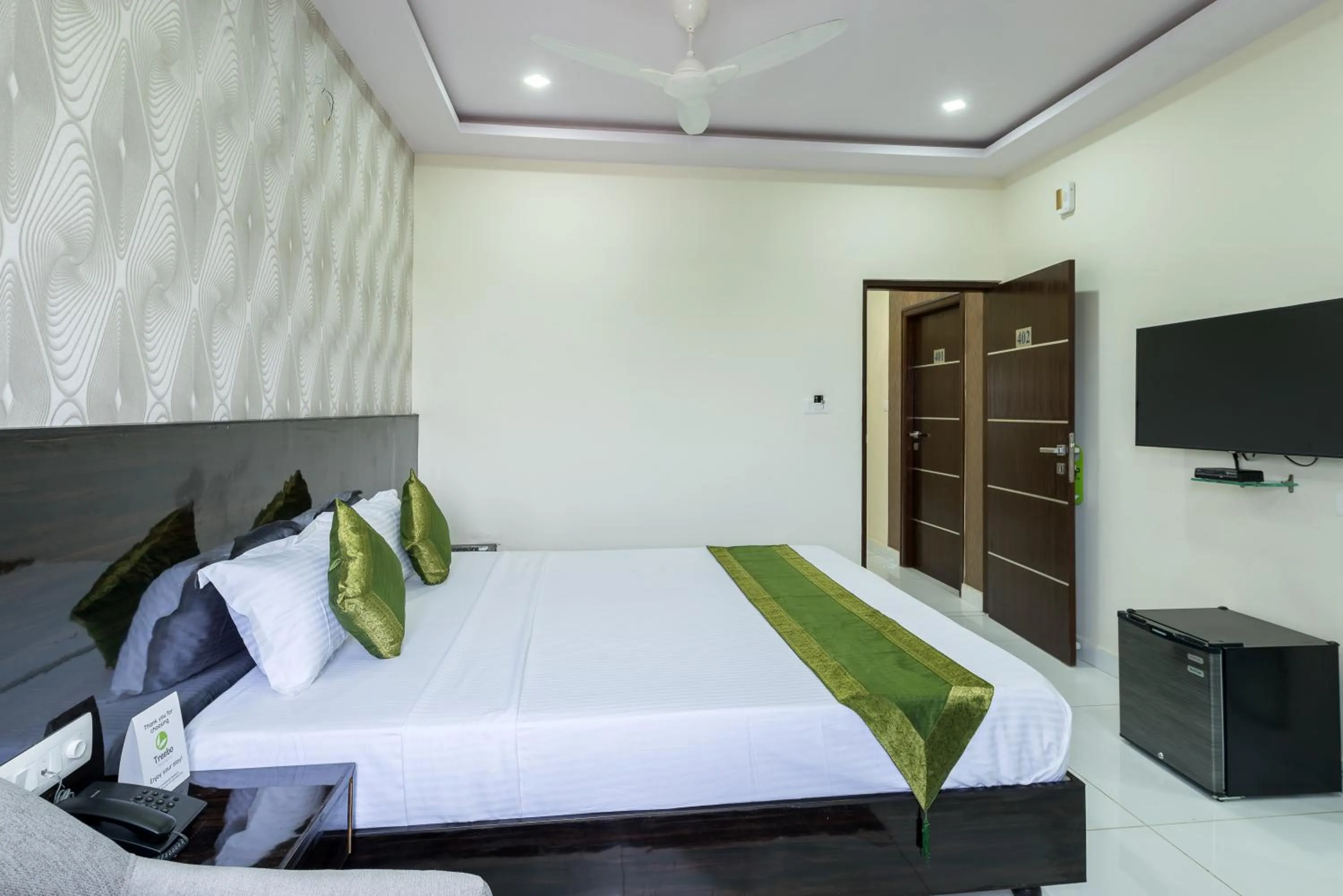 Bed in Treebo Greenwood Premier Suites, Old Airport Road