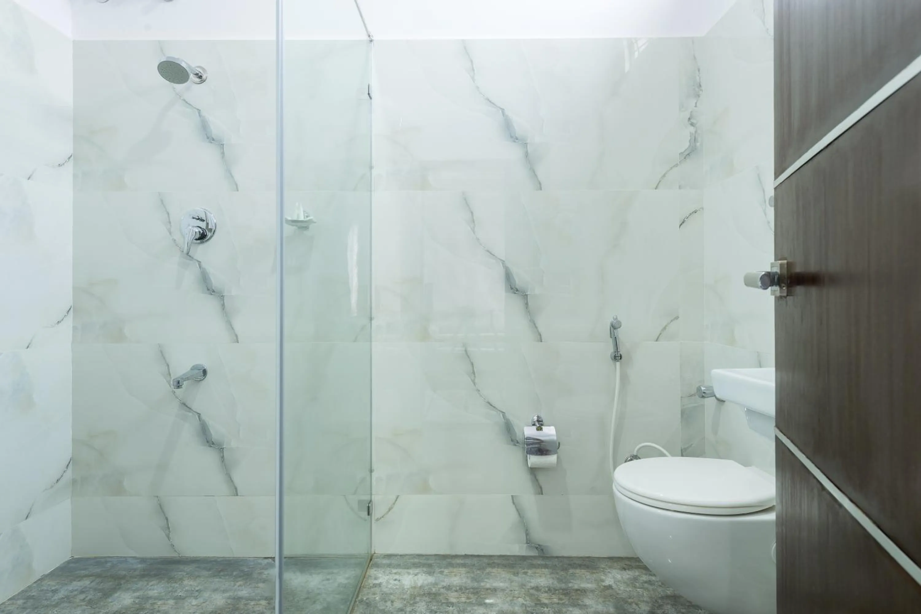 Toilet in Treebo Greenwood Premier Suites, Old Airport Road