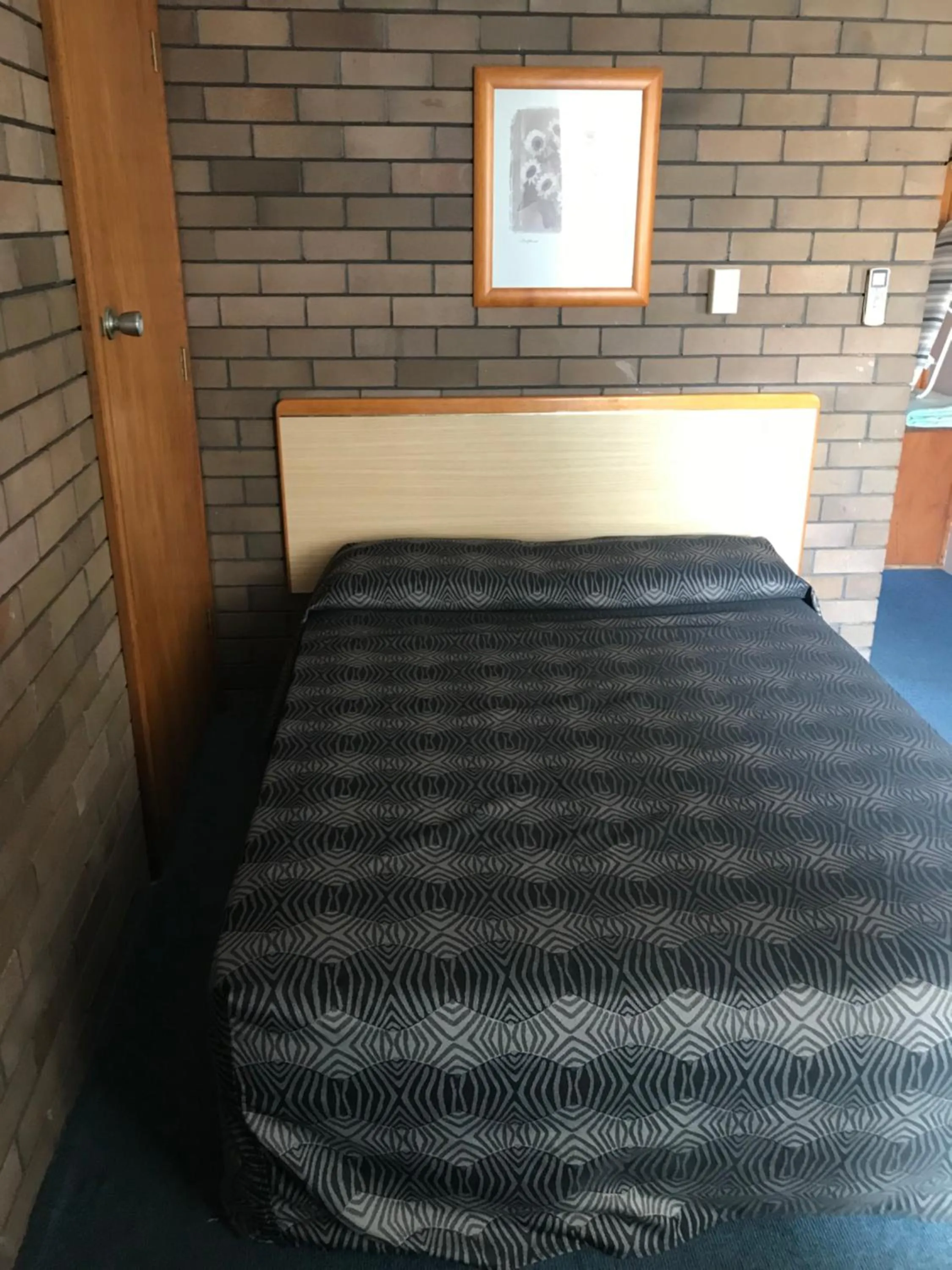 Bed in Downtown Motel