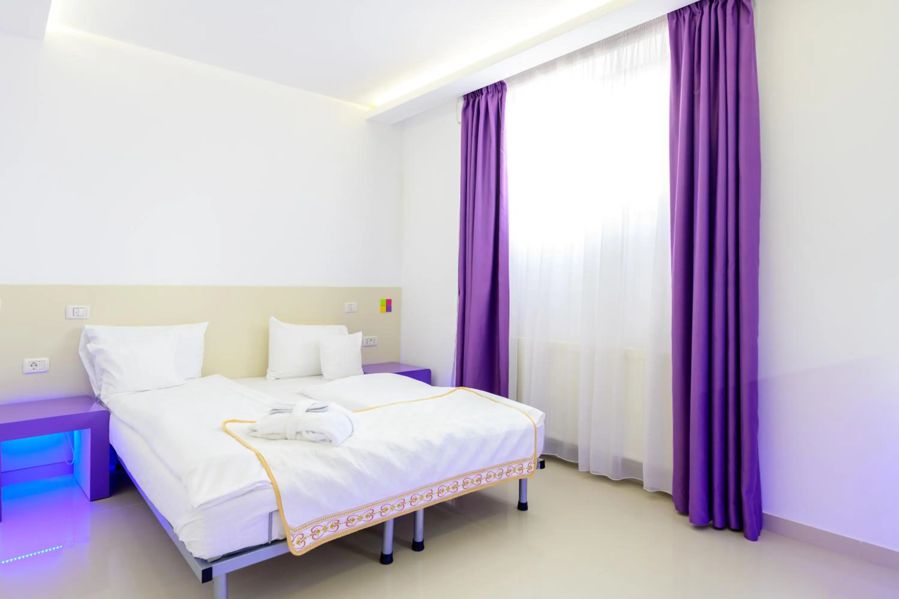 Bed in Hotel Christina Plus