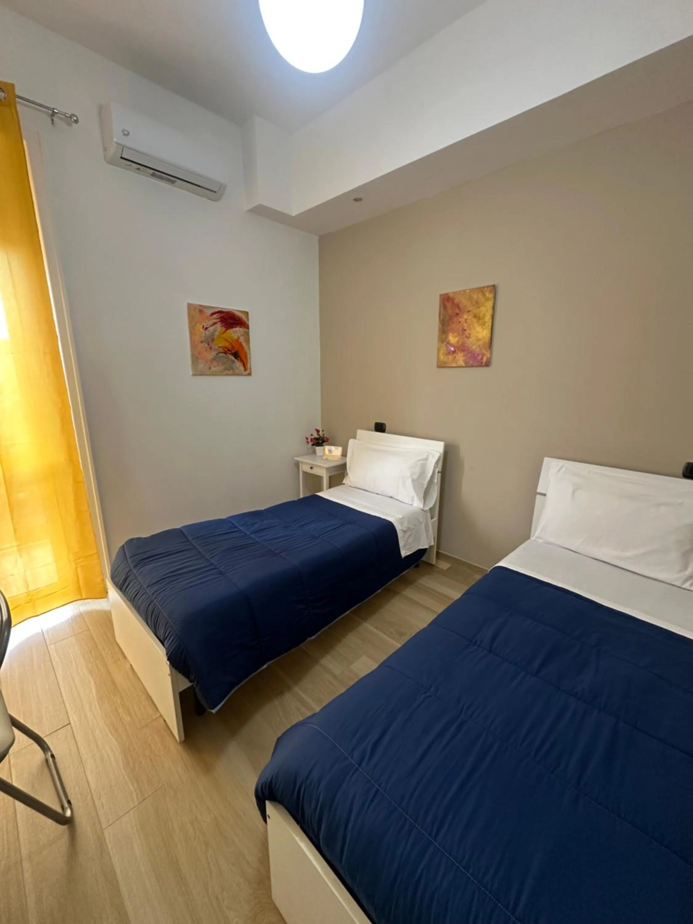 Photo of the whole room, Bed in Iris Inn