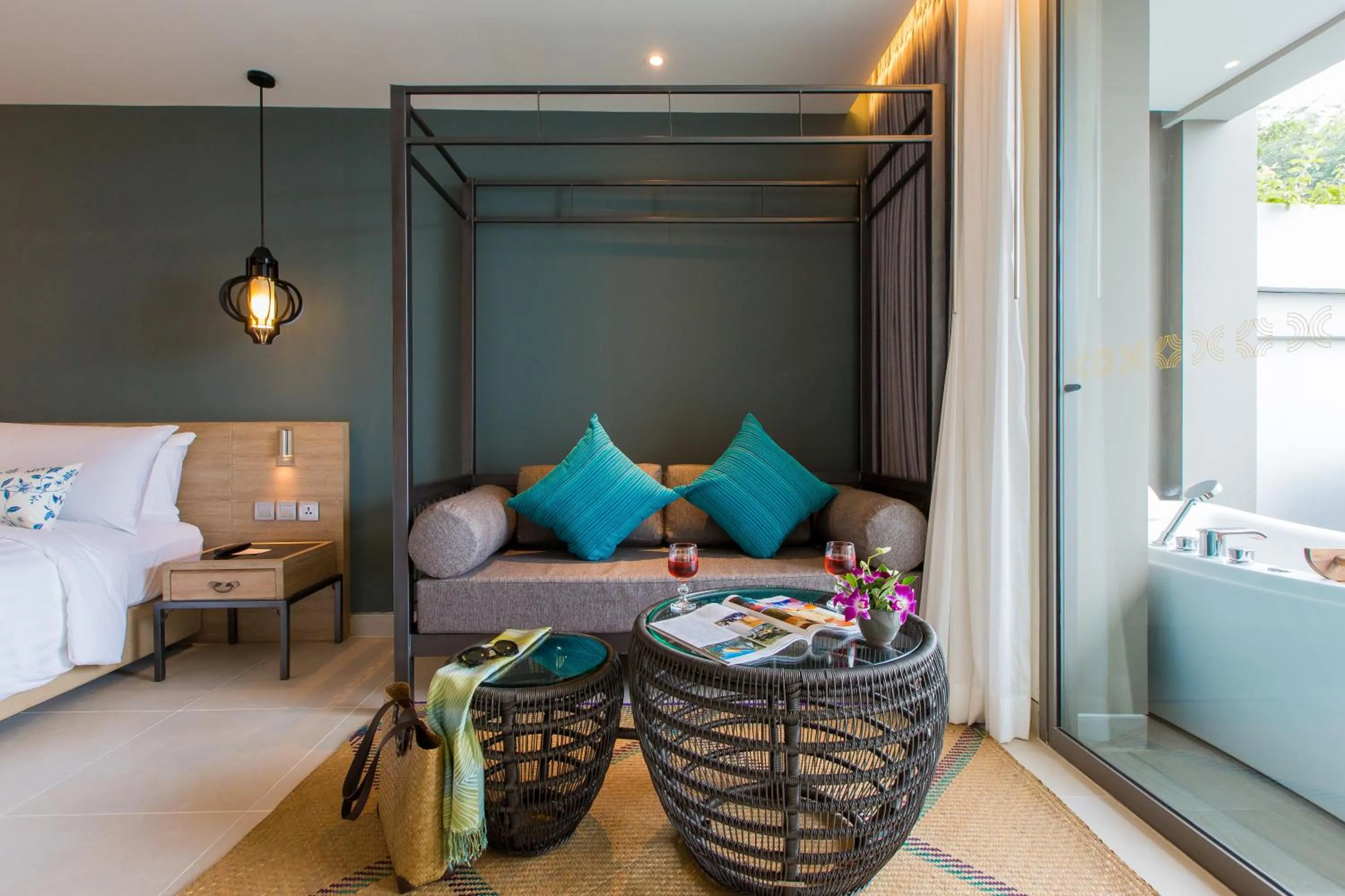 Seating area, Bed in Fusion Suites Phuket Patong