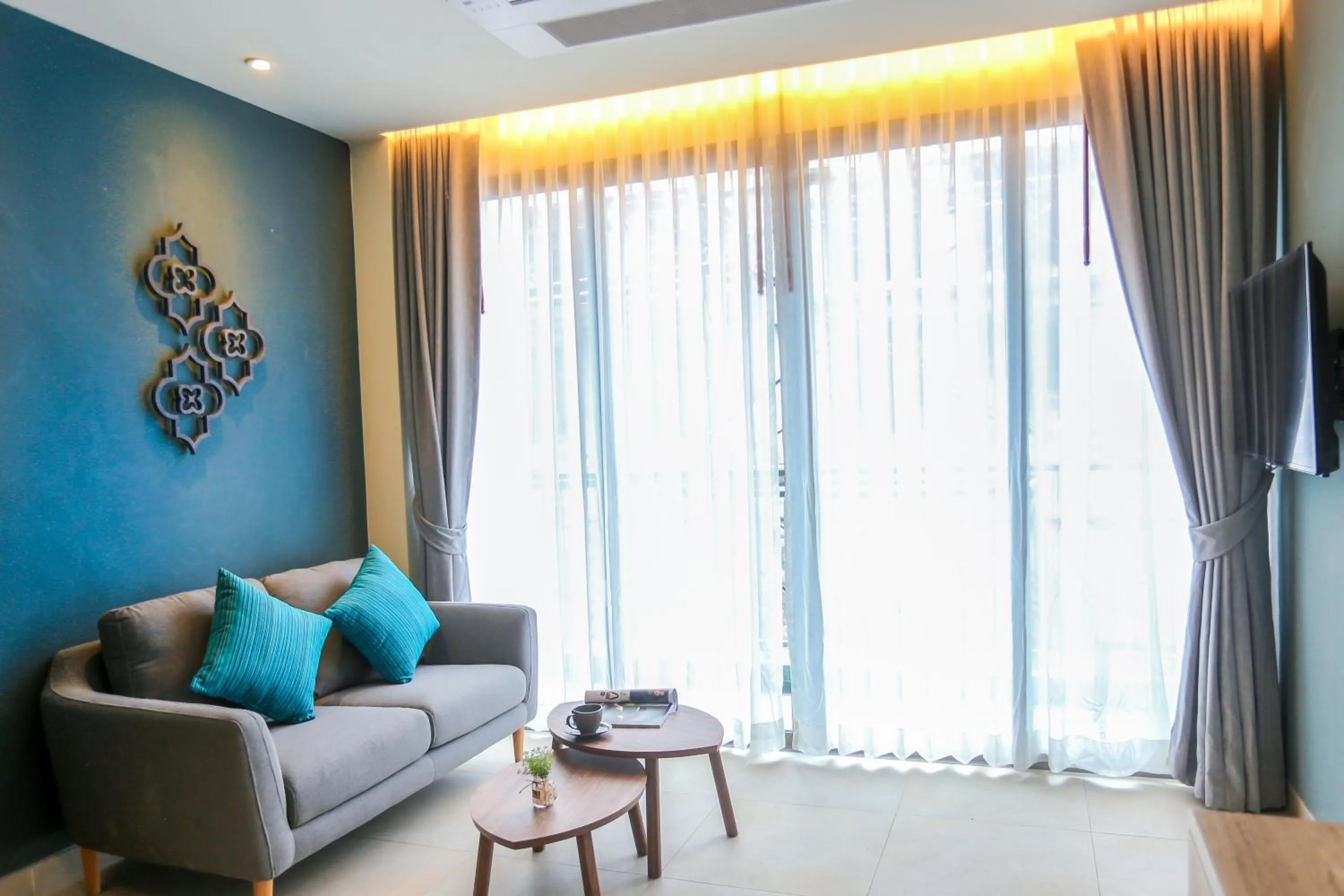 Living room in Fusion Suites Phuket Patong