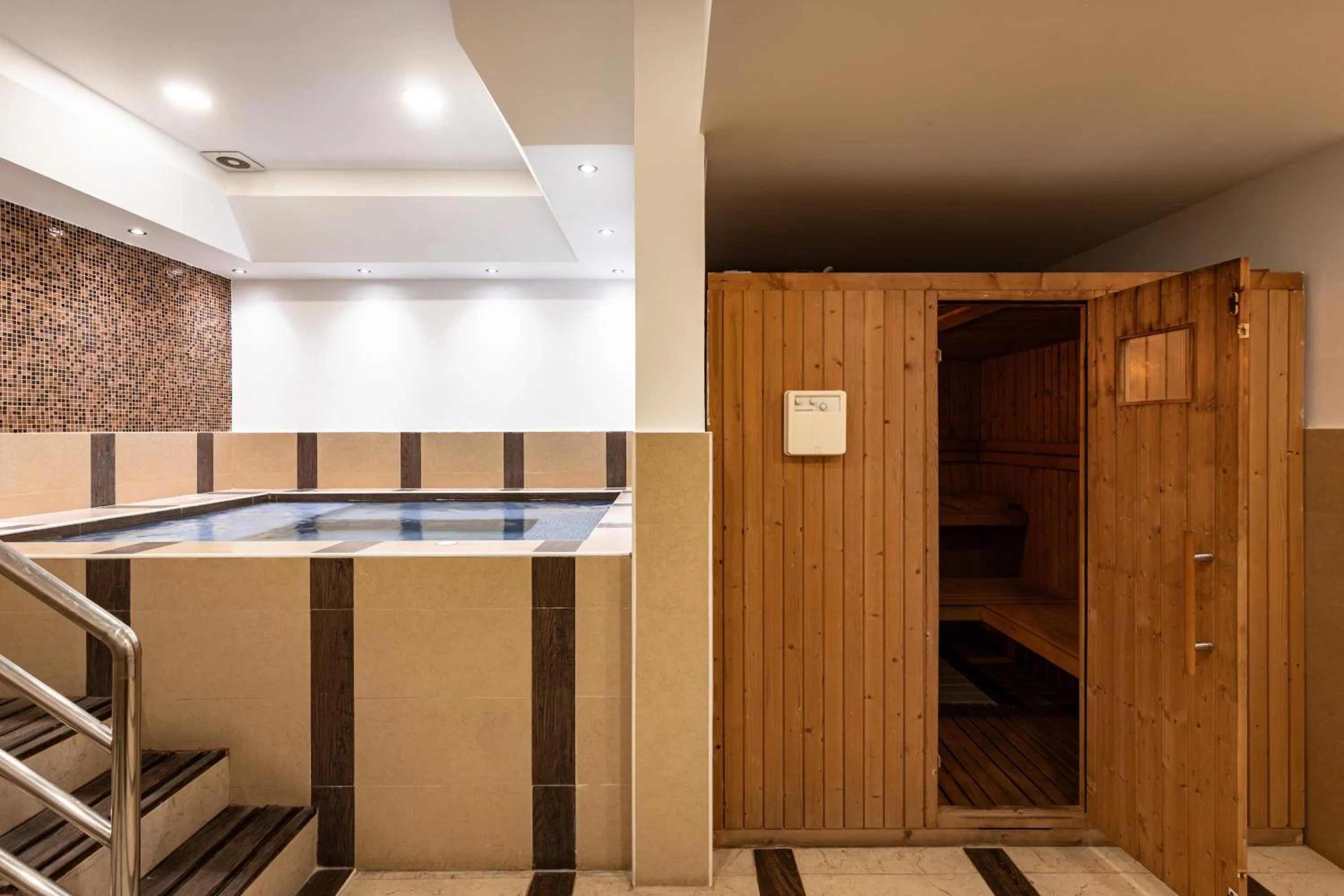 Sauna in Palmeiras Suite Hotel