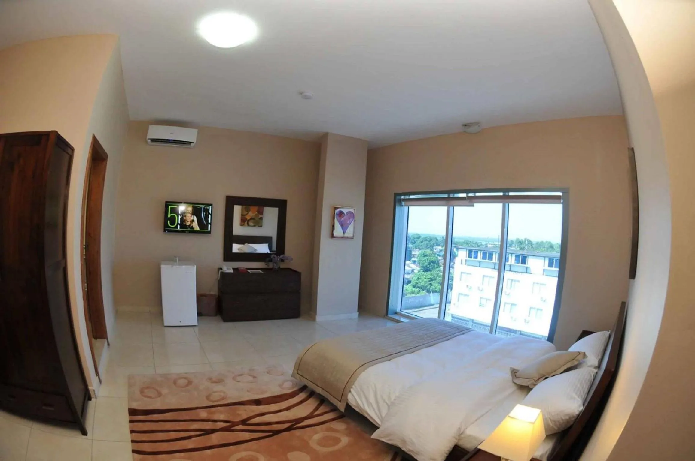 Bed in Murex Plaza Hotel & Suites