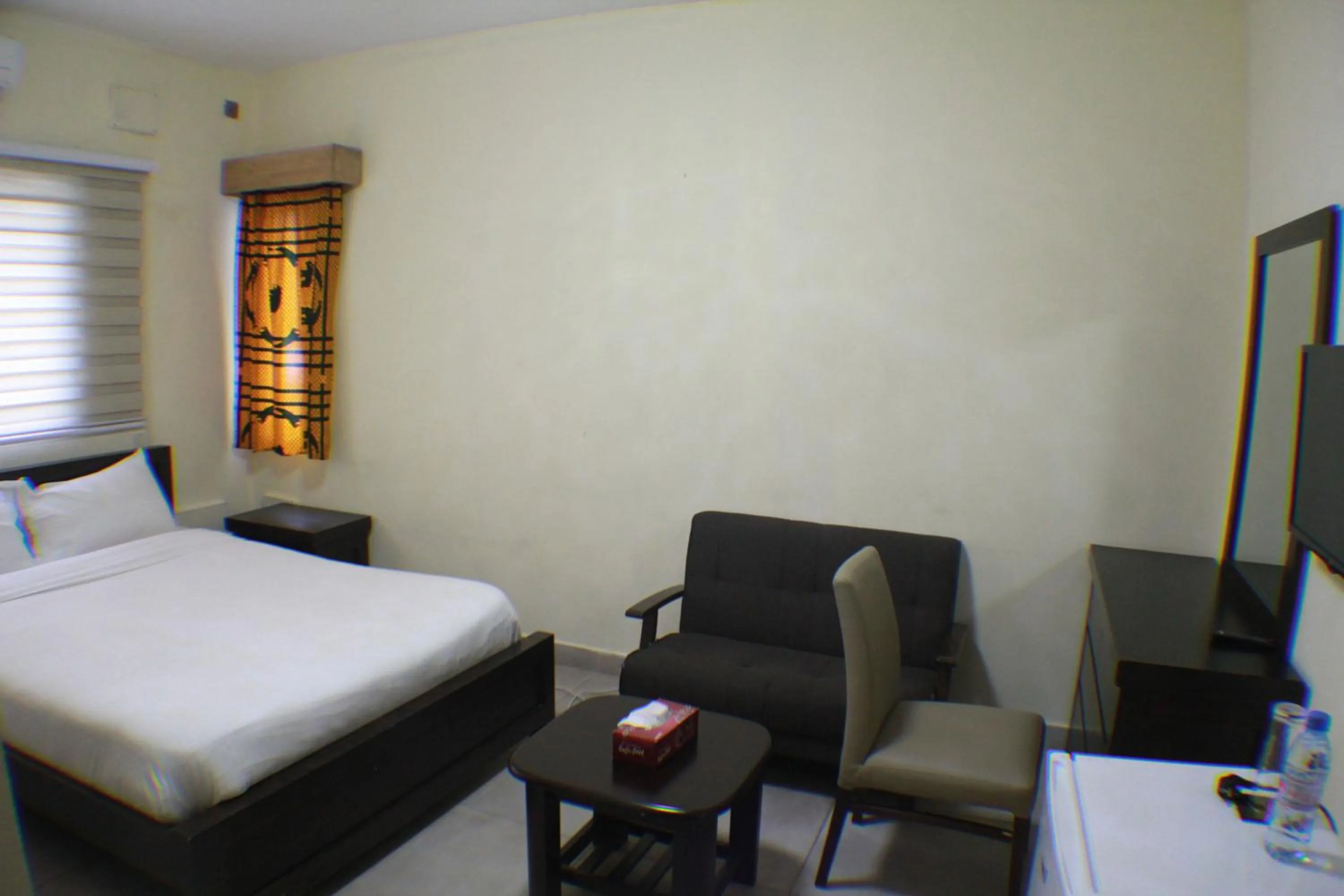 Bed in Murex Plaza Hotel & Suites