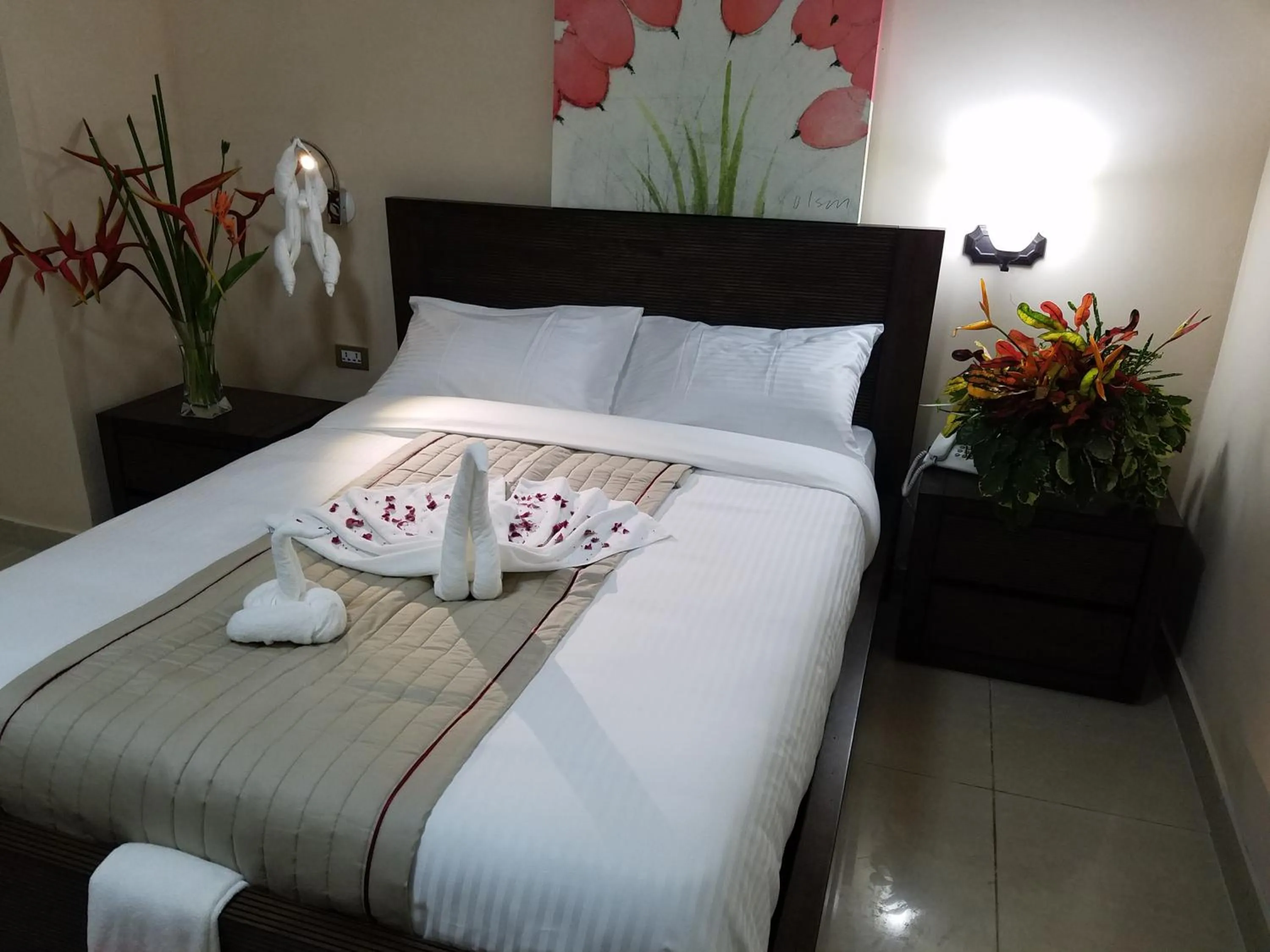 Bed in Murex Plaza Hotel & Suites