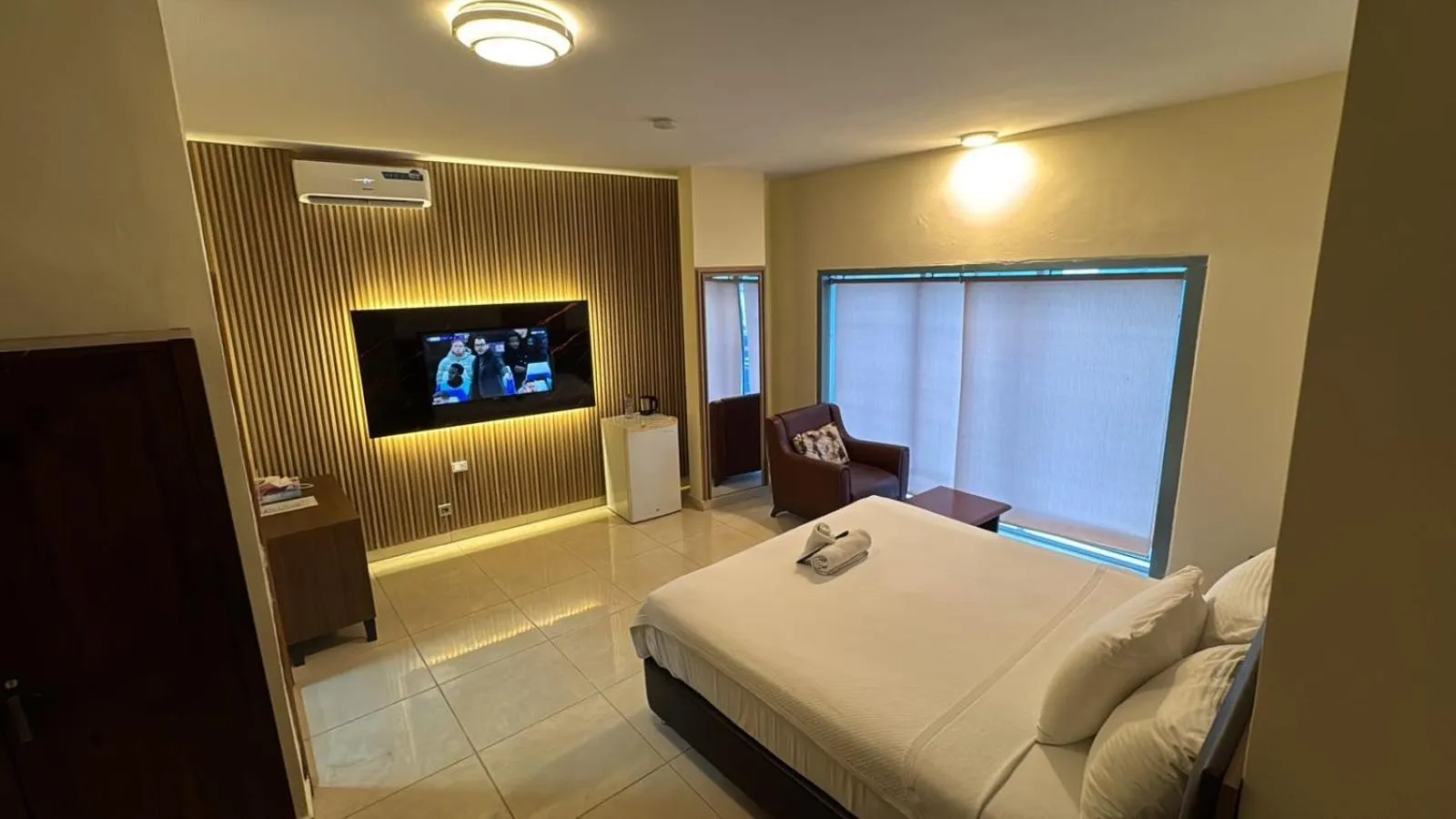 Bed in Murex Plaza Hotel & Suites