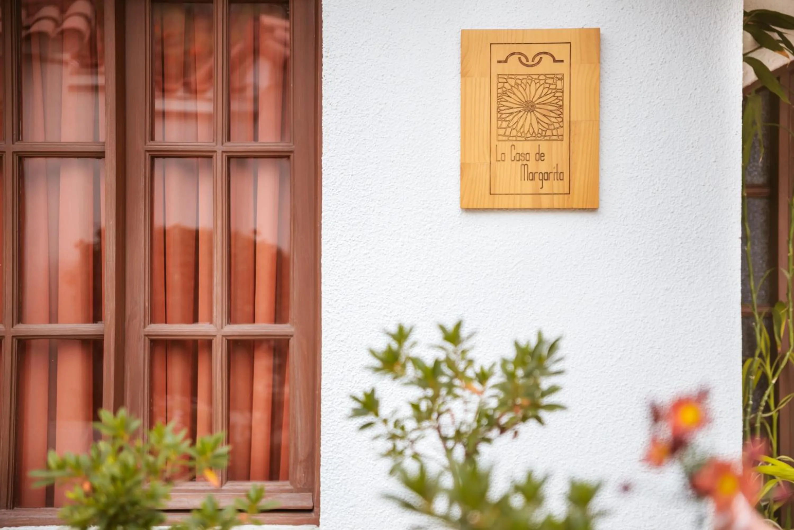 Property logo or sign in Hotel Boutique La Casa de Margarita