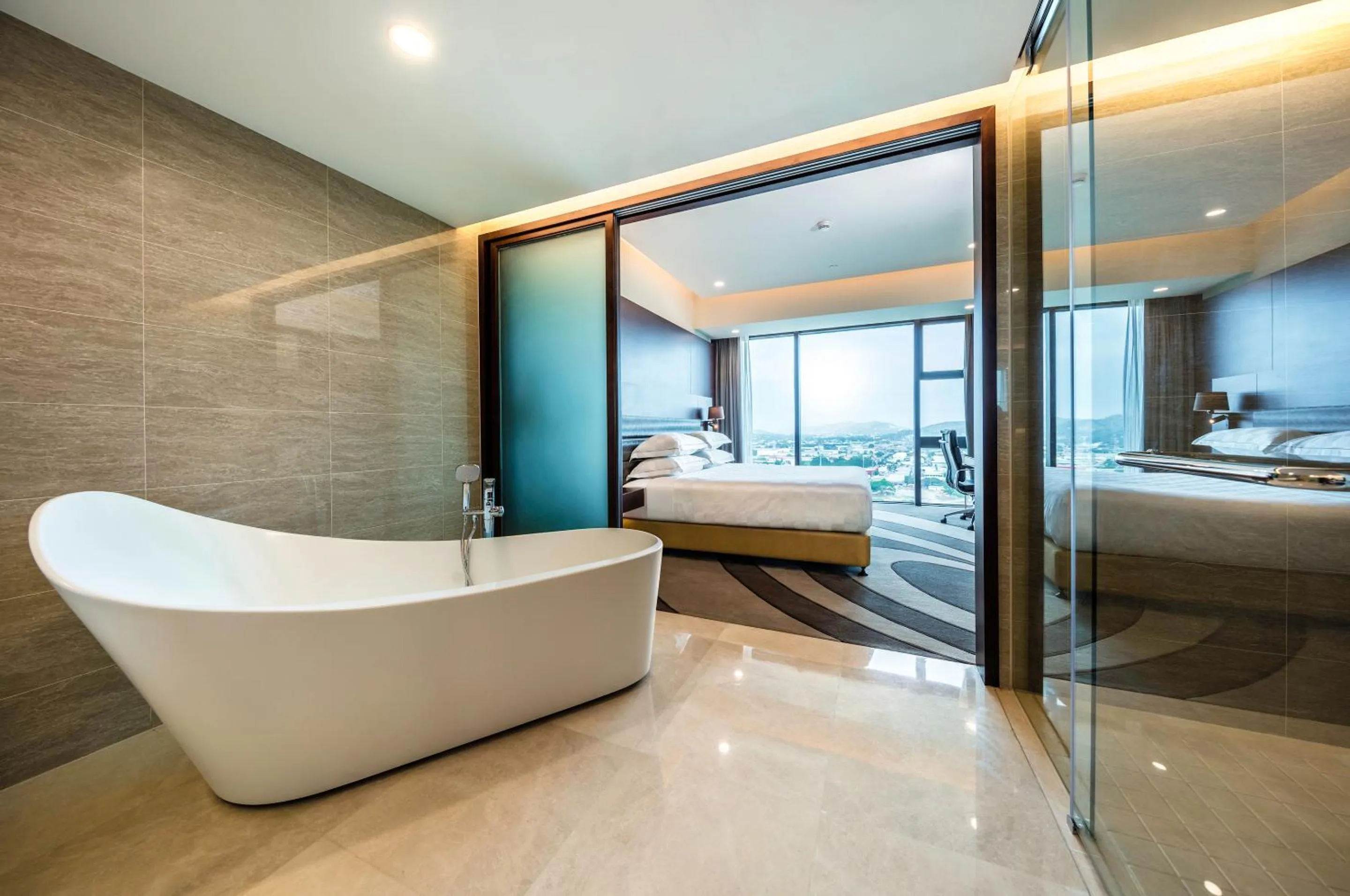 Bathroom, Bed in The Stanley Hotel & Suites
