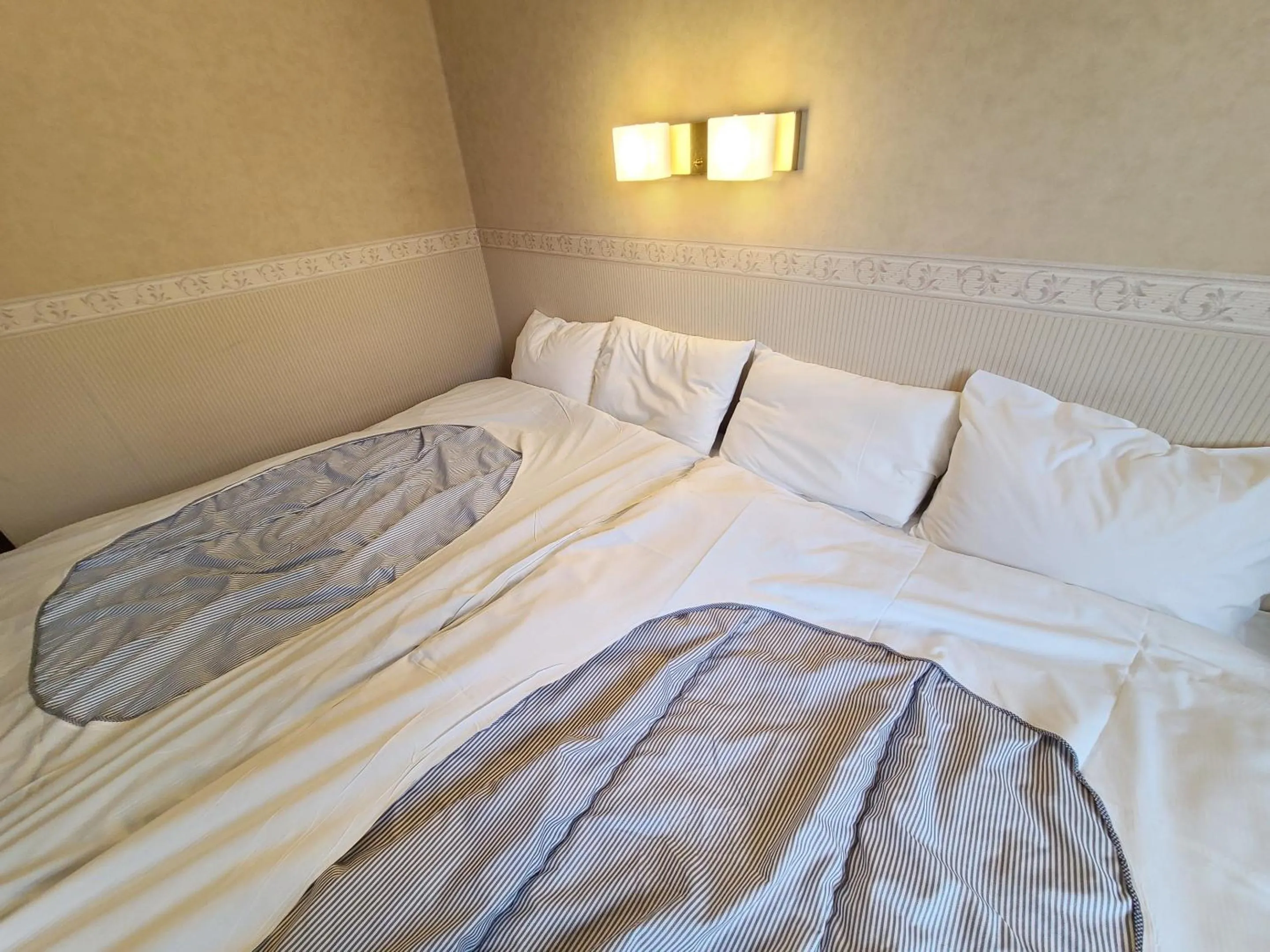 Bed in Shirakabako Hotel Paipuno Kemuri