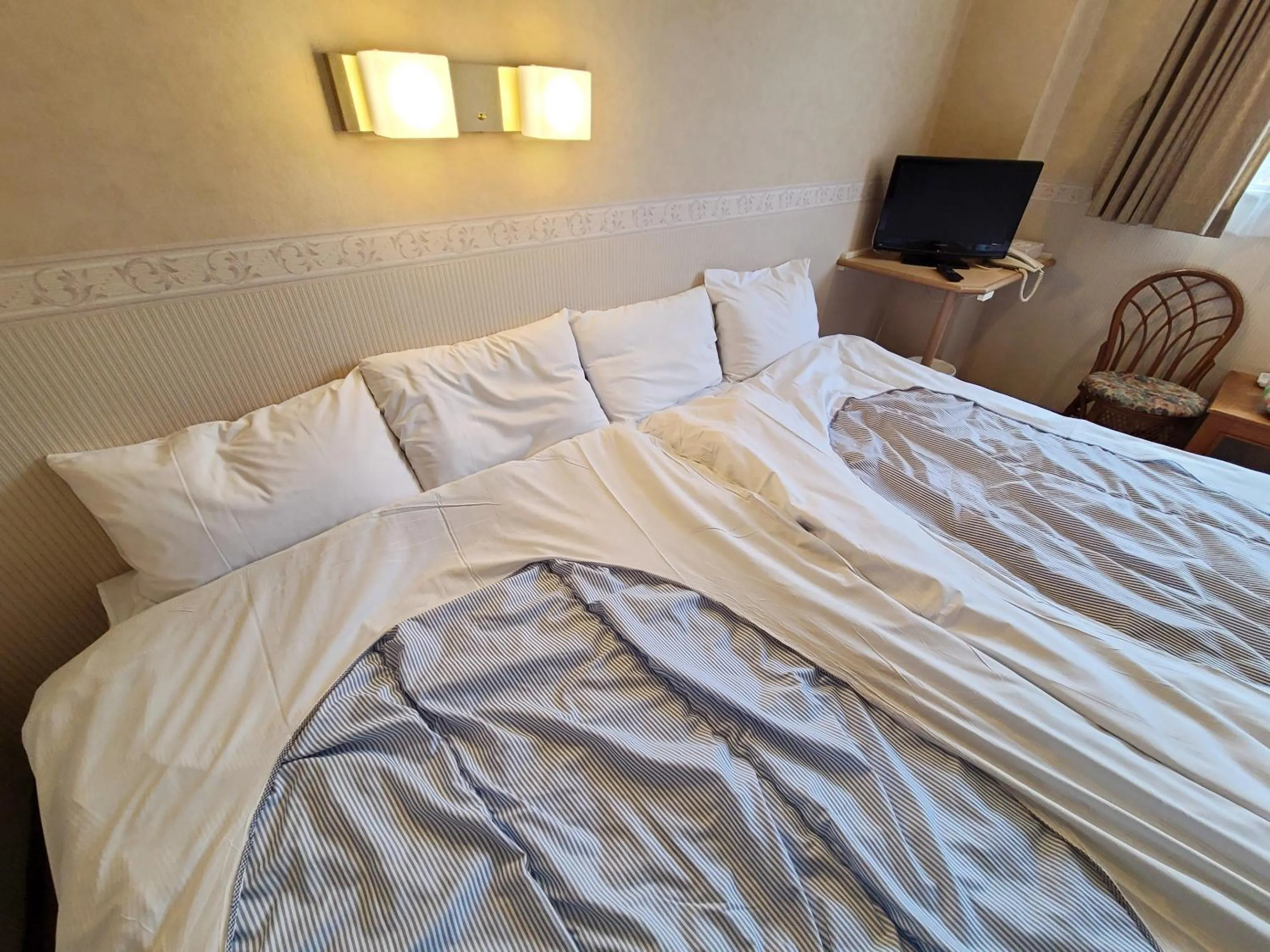 Bed in Shirakabako Hotel Paipuno Kemuri