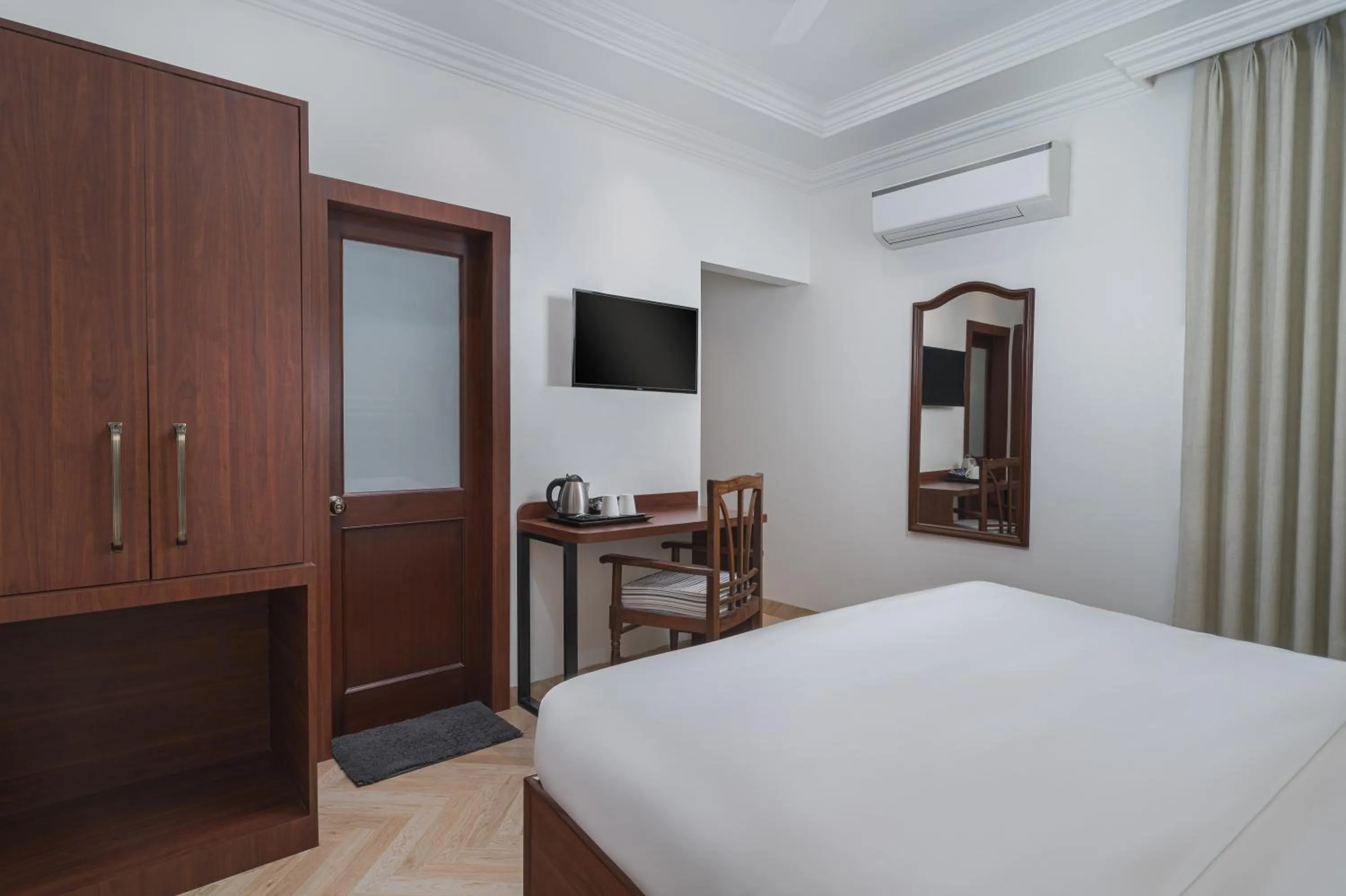 TV and multimedia, Bed in Hotel Ganga Maiya