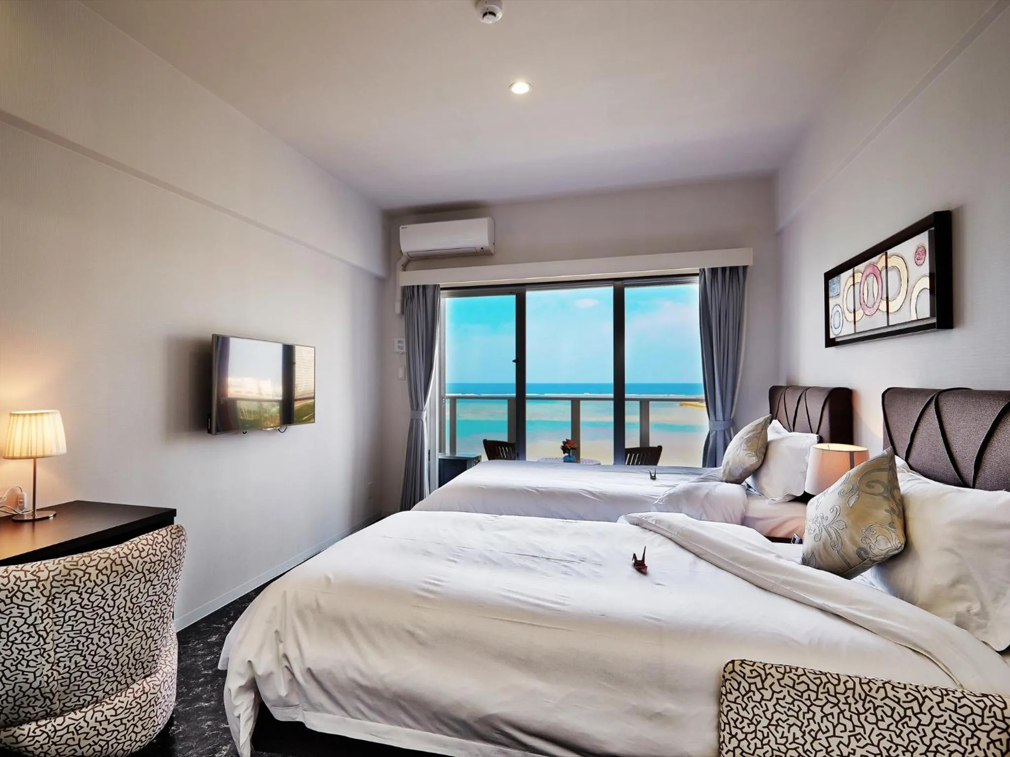 Photo of the whole room, Bed in Beach Front Tower Mihama by DSH