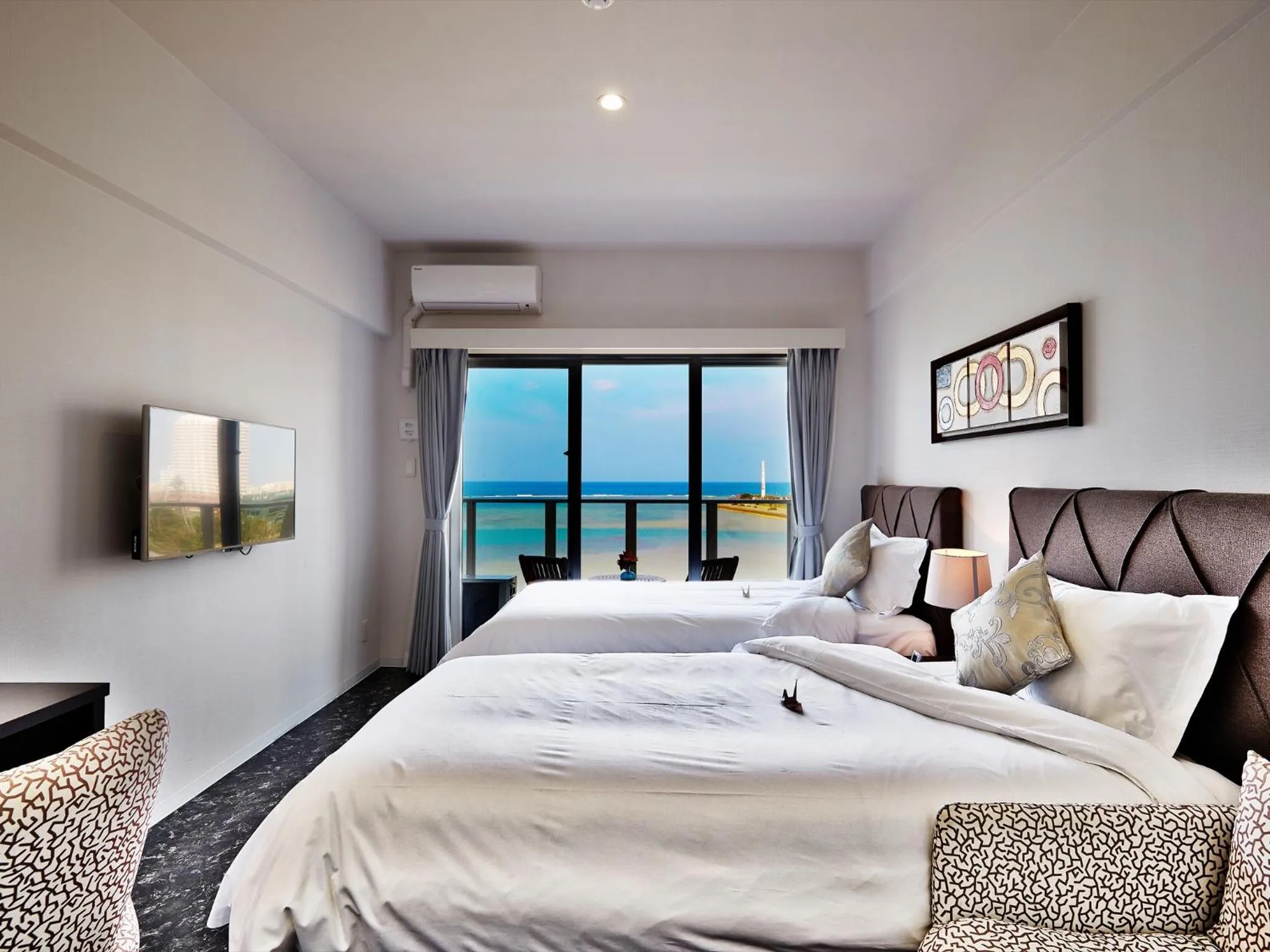 Photo of the whole room, Bed in Beach Front Tower Mihama by DSH