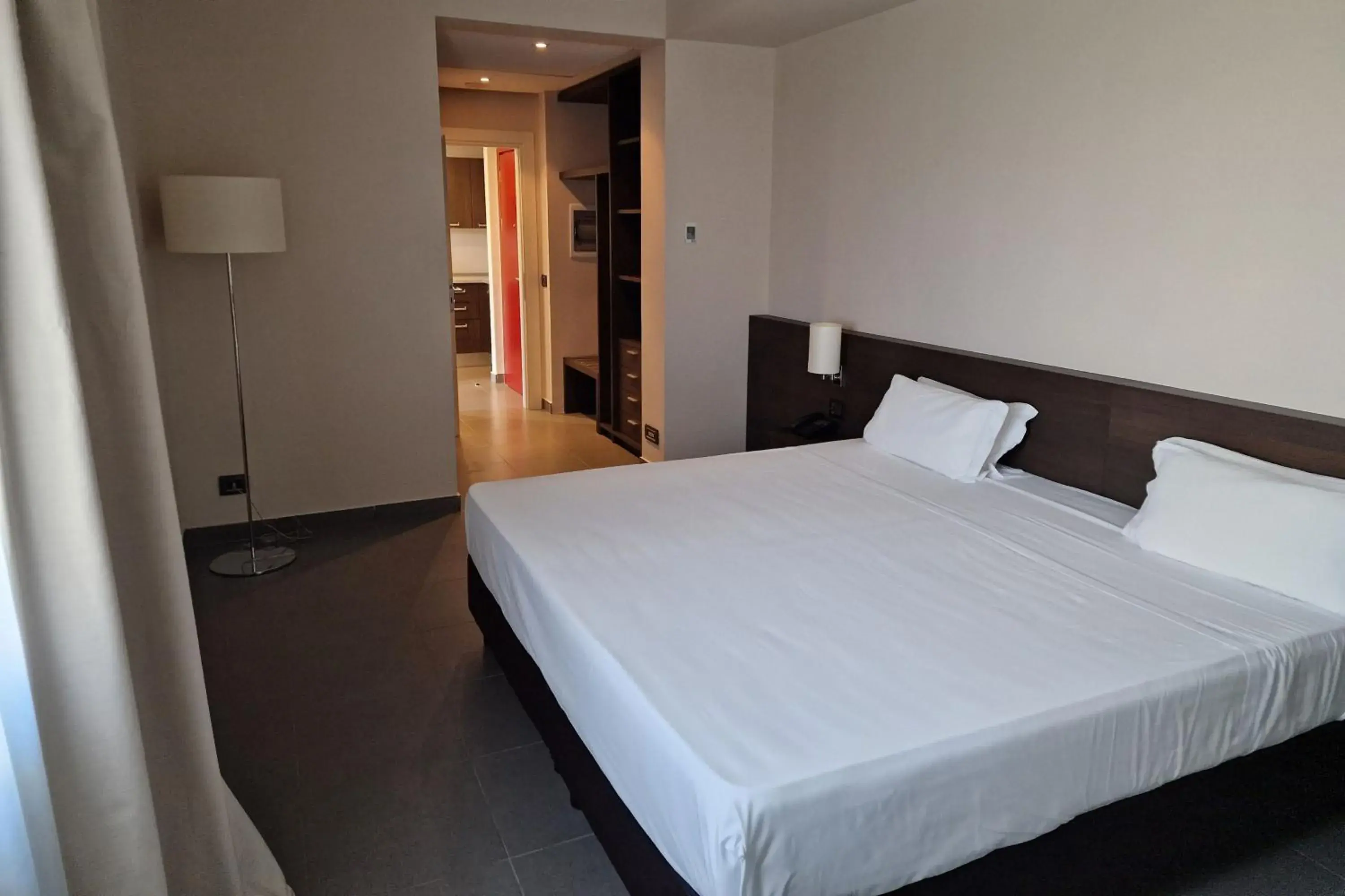 One-Bedroom King Suite with Balcony and Sofa Bed in Inn Naples Airport One-Bedroom King Suite with Balcony and Sofa Bed in Inn Naples Airport