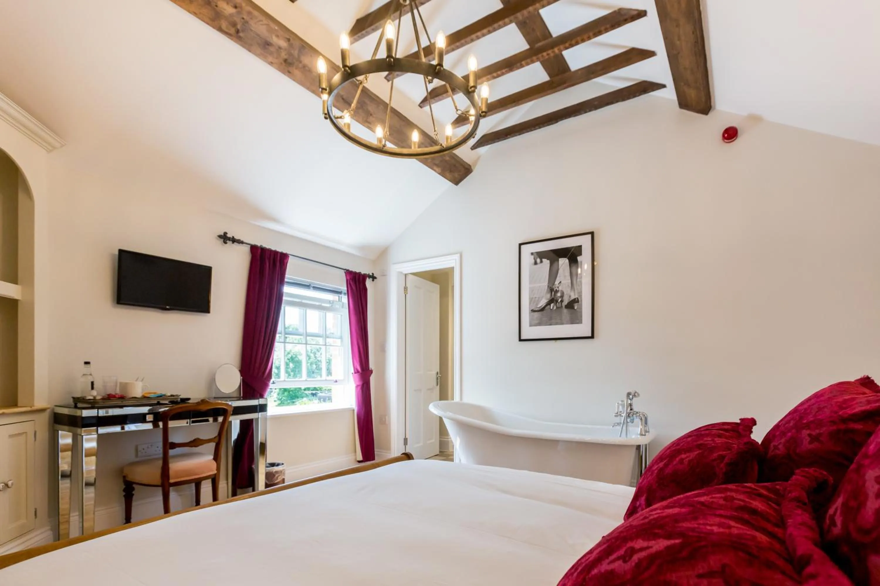 Bed in The Dog & Gun Inn