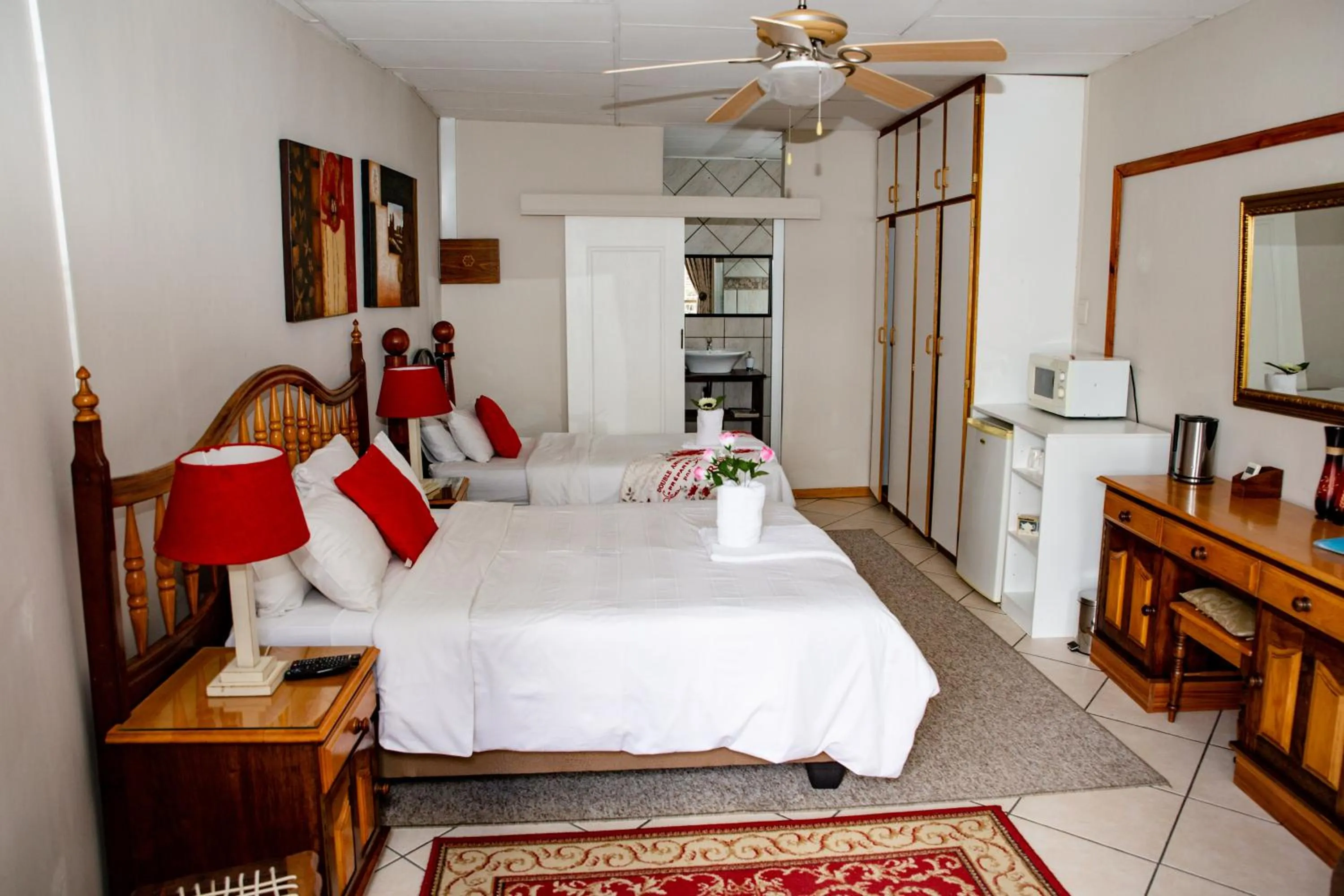 Bed in Woodpecker Guesthouse