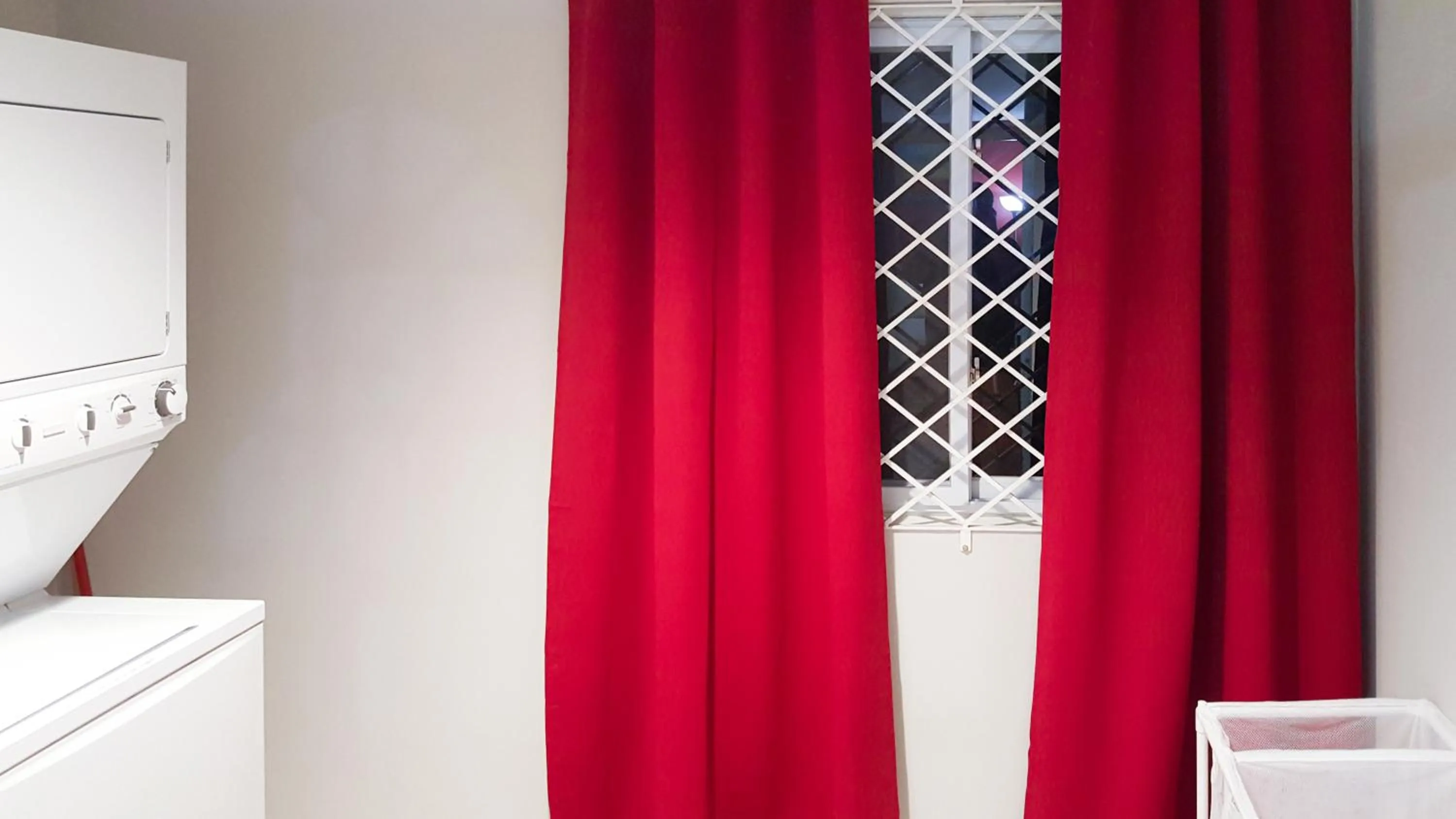 washing machine in New Kingston Guest Apartments @ Donhead