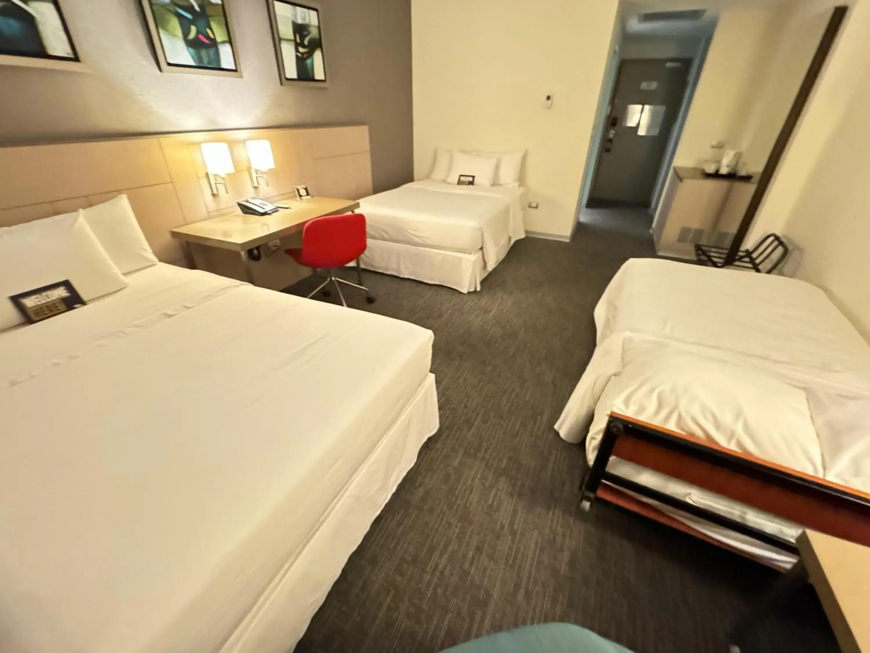 Standard Triple Room in BTH Rebel Tacna Standard Triple Room in BTH Rebel Tacna