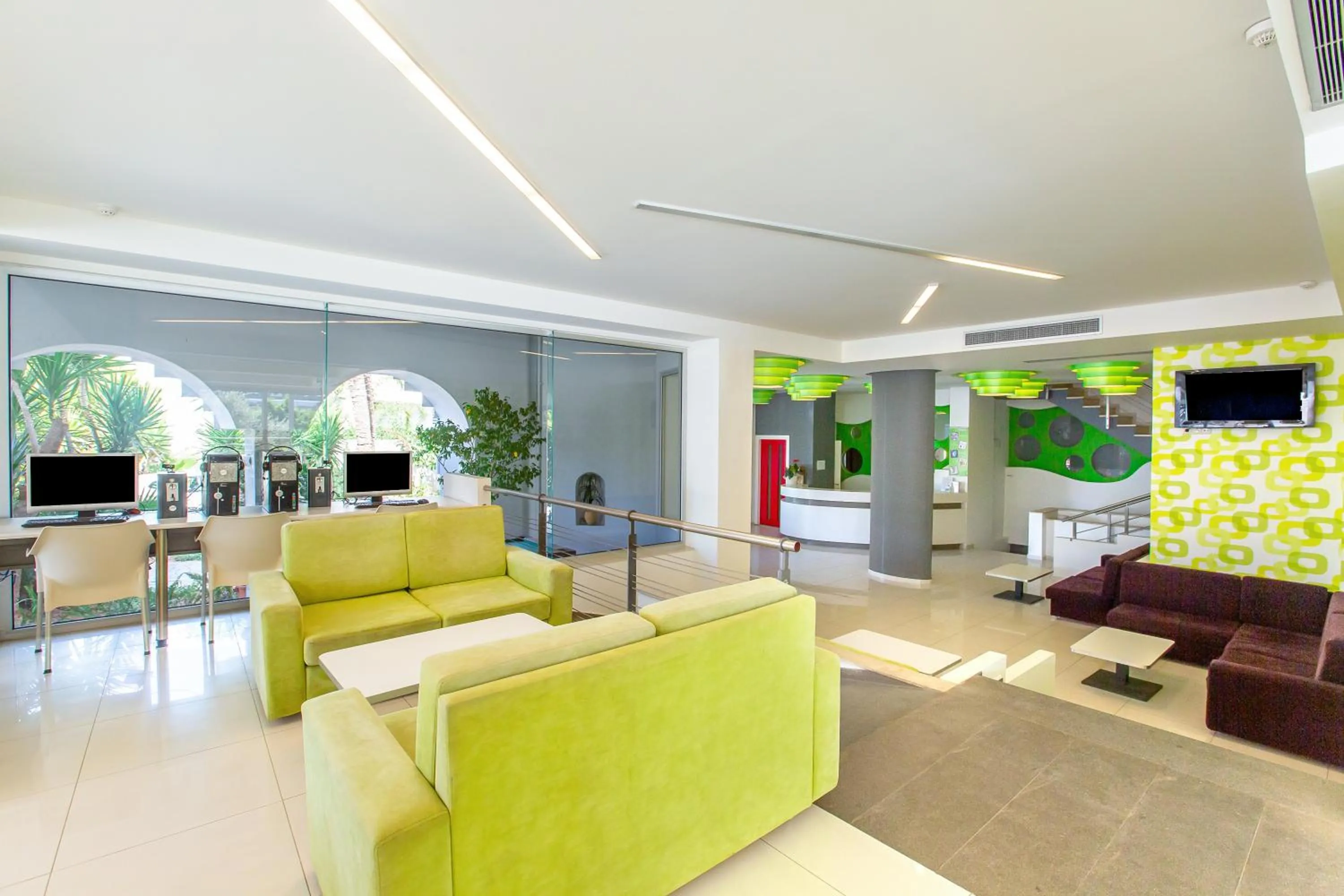 Communal lounge/ TV room in Hermes Hotel