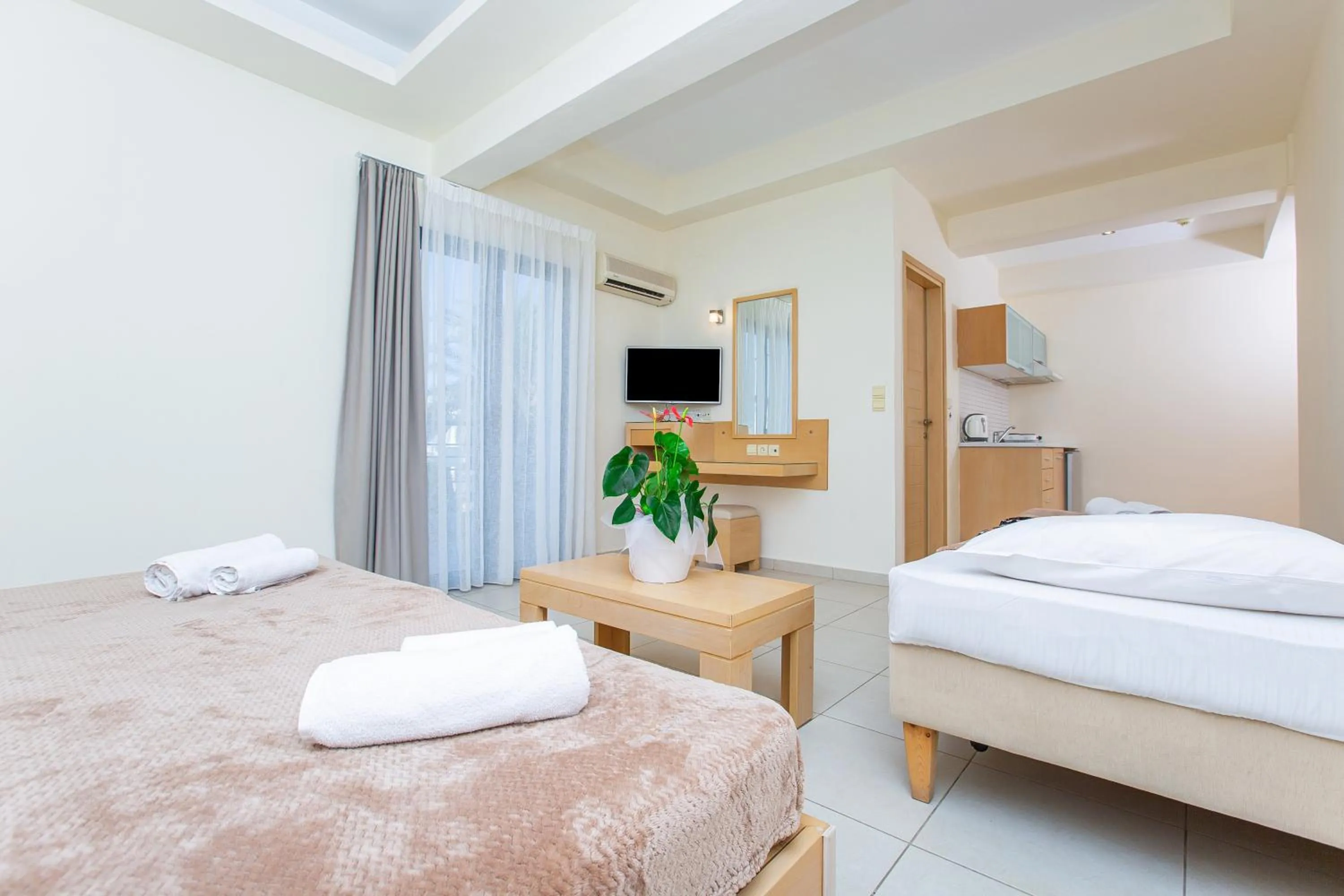 Kitchen or kitchenette, Bed in Hermes Hotel