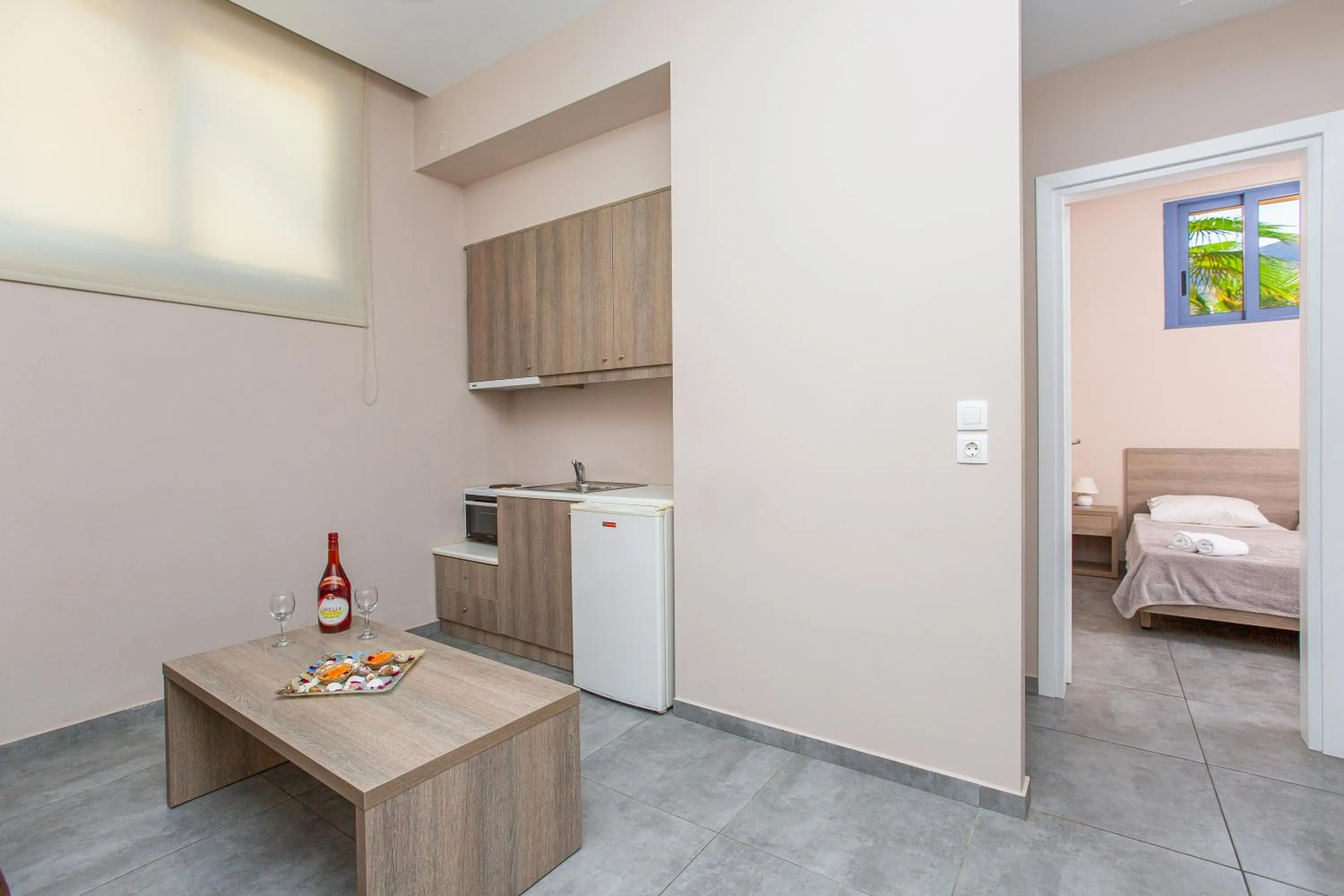 Living room, Bed in Hermes Hotel