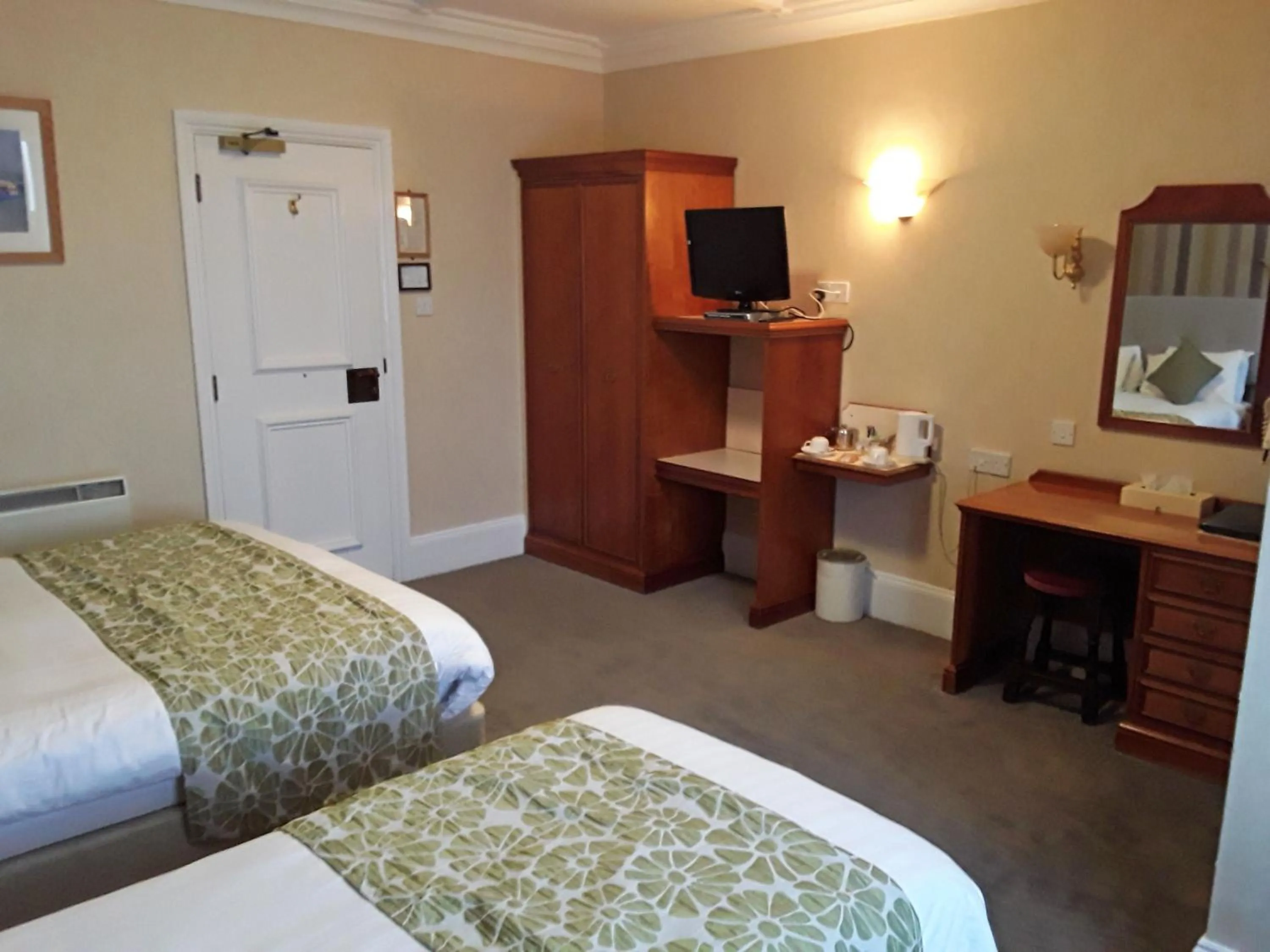 Bed in The Cottage Hotel