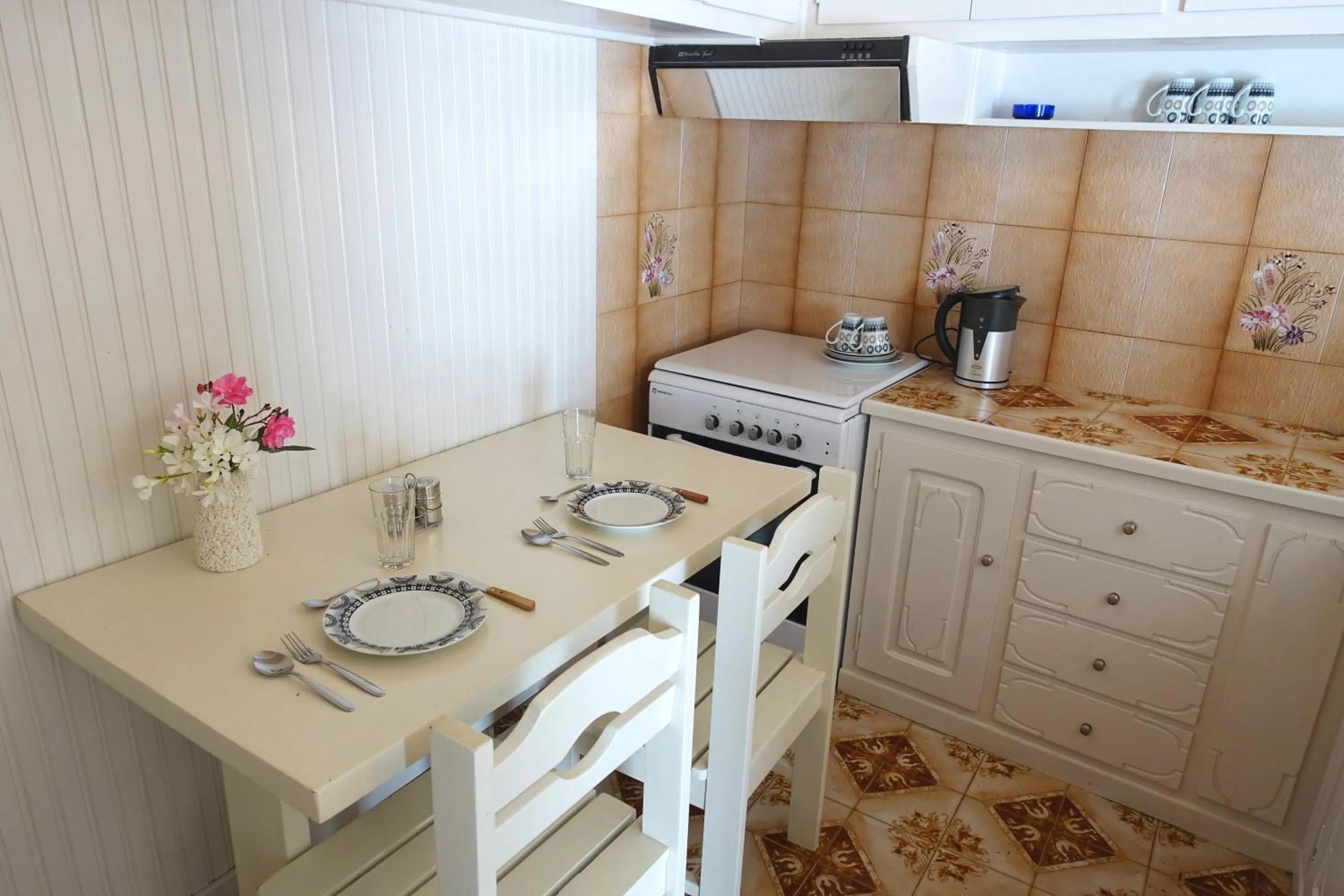 Kitchen or kitchenette in Le Coq Apartments