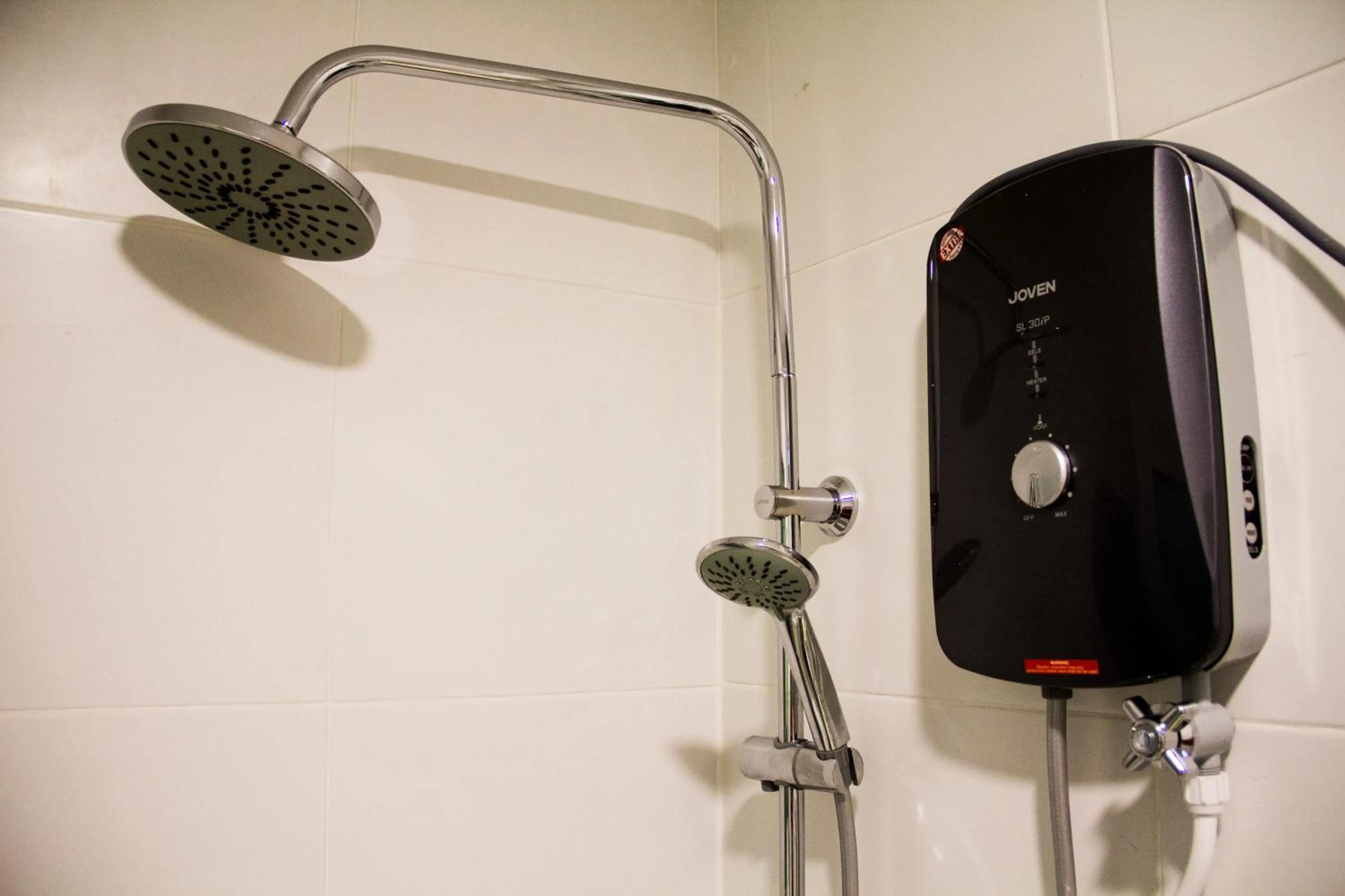 Shower in Angel Resthouse Hotel