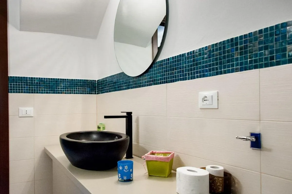 Bathroom in Appartamenti Antico Frantoio Doria