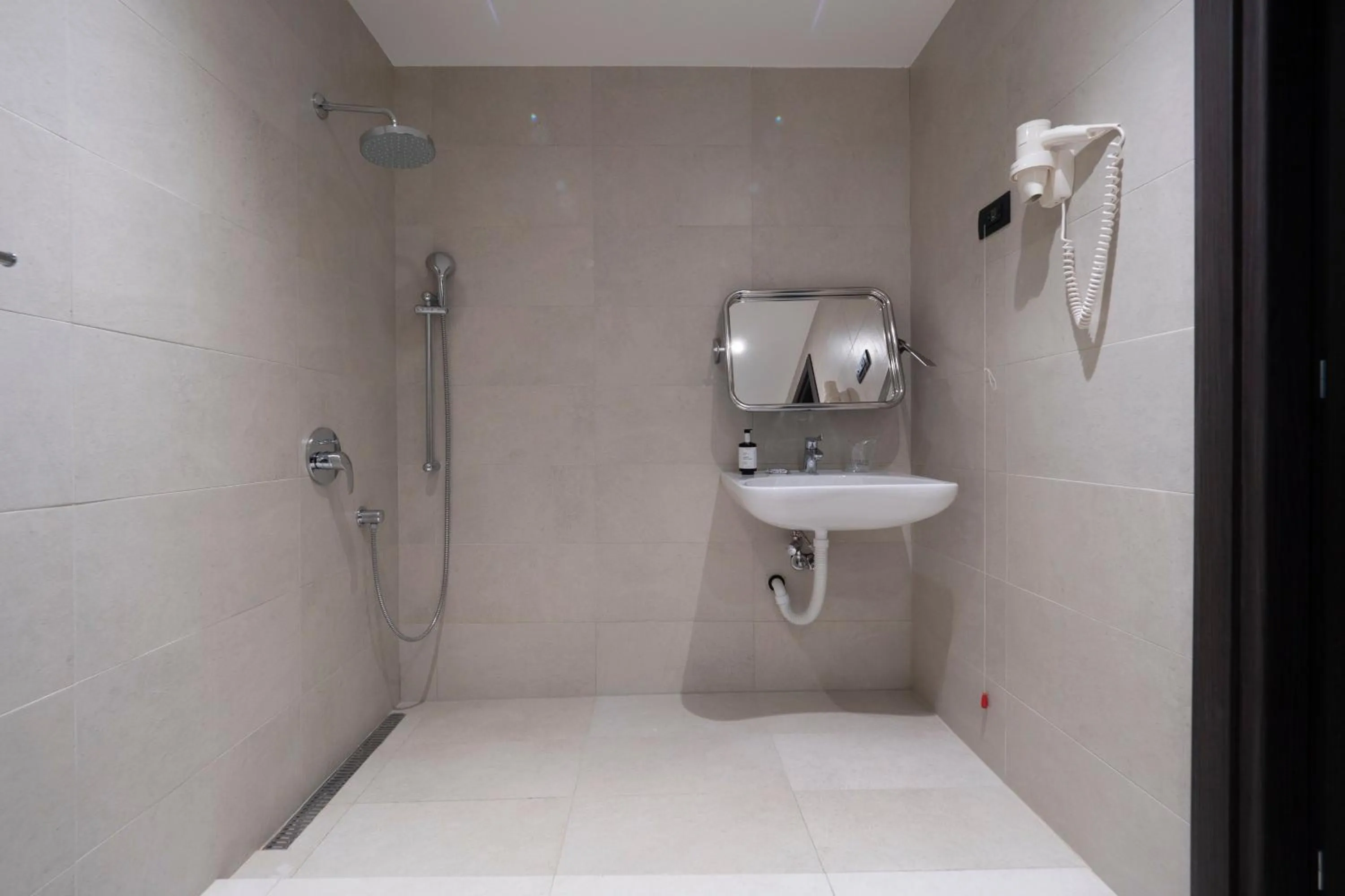 Bathroom in voco - Podgorica by IHG