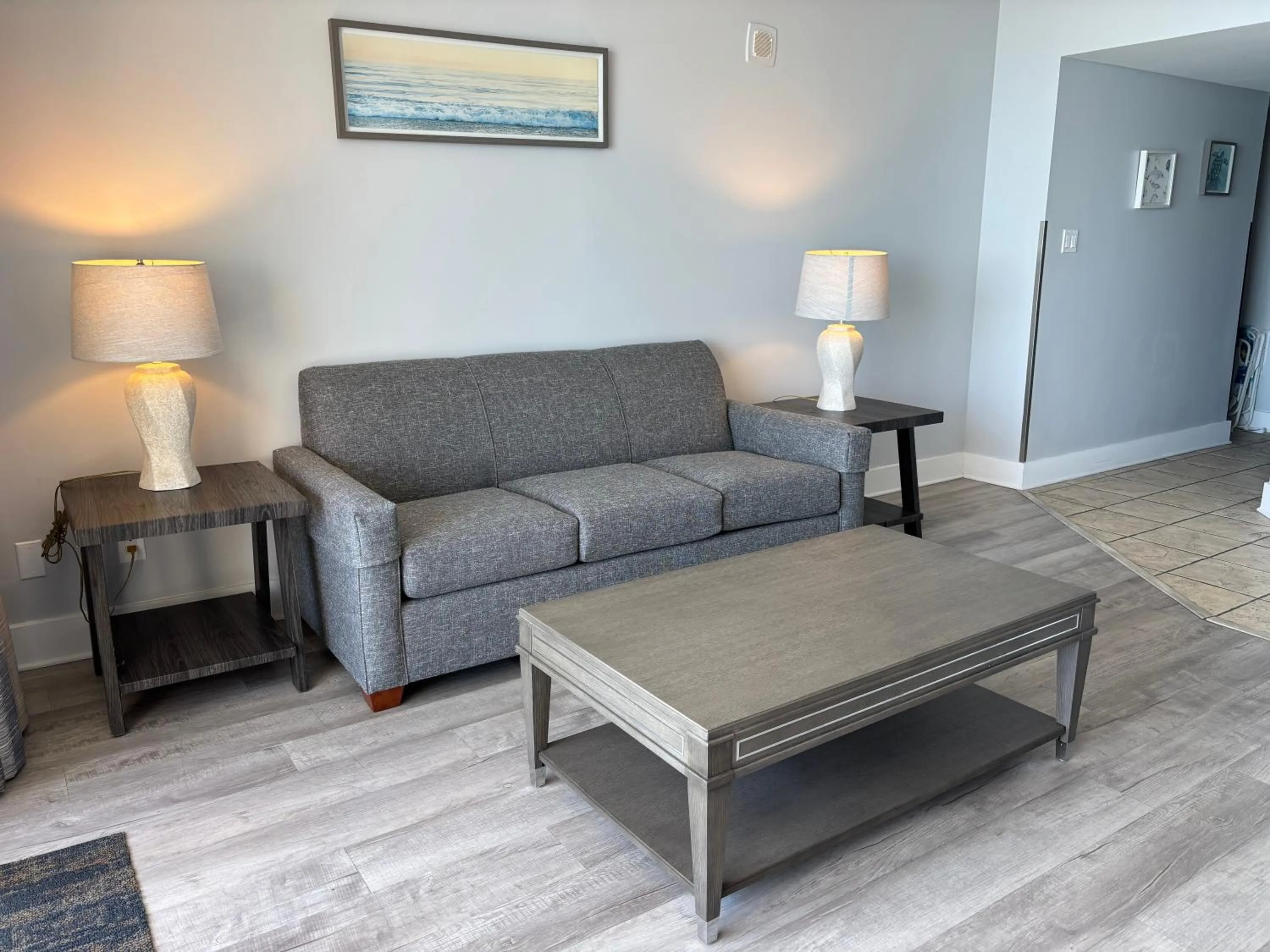 Living room in Scenic Views from the balcony at Ocean Forest Plaza Condos