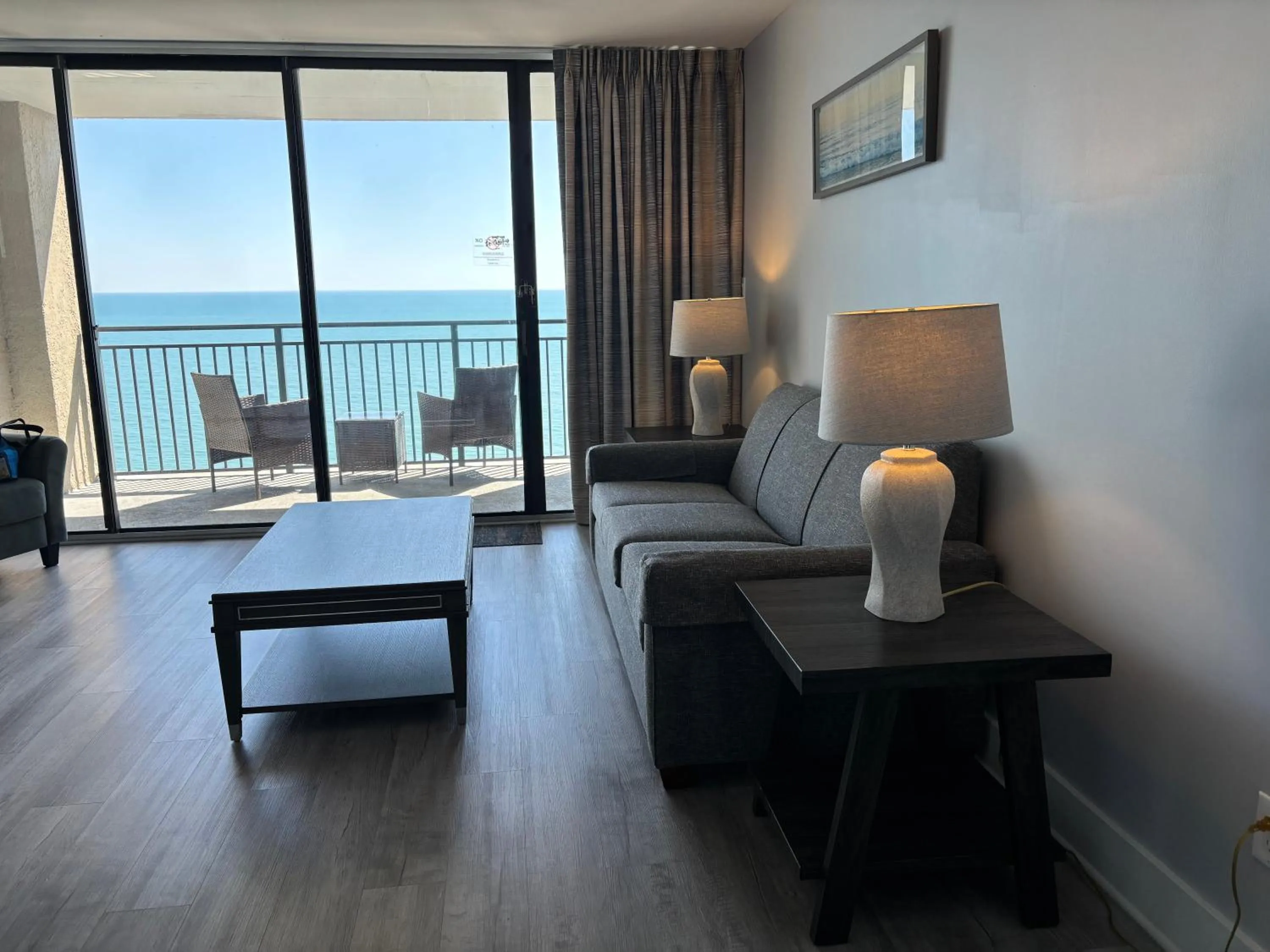 Living room in Scenic Views from the balcony at Ocean Forest Plaza Condos
