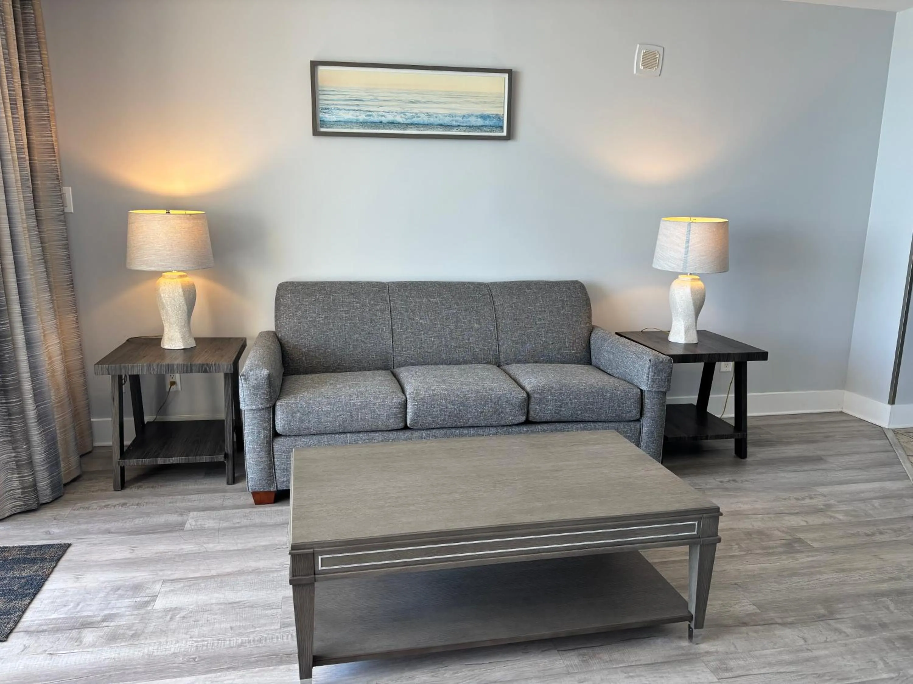 Living room in Scenic Views from the balcony at Ocean Forest Plaza Condos