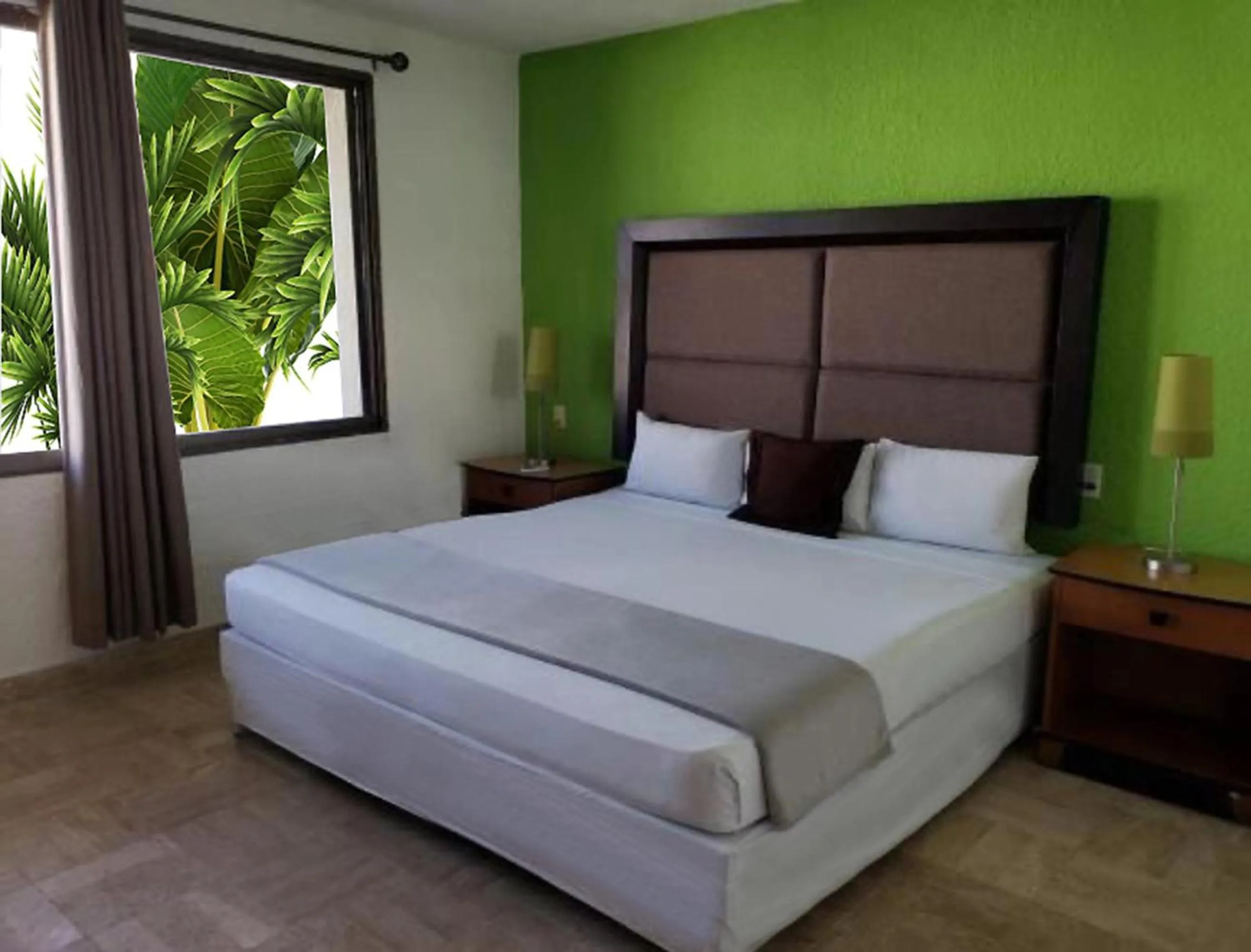 Bed in Nirvana Hotel - Cancun Hotel Zone