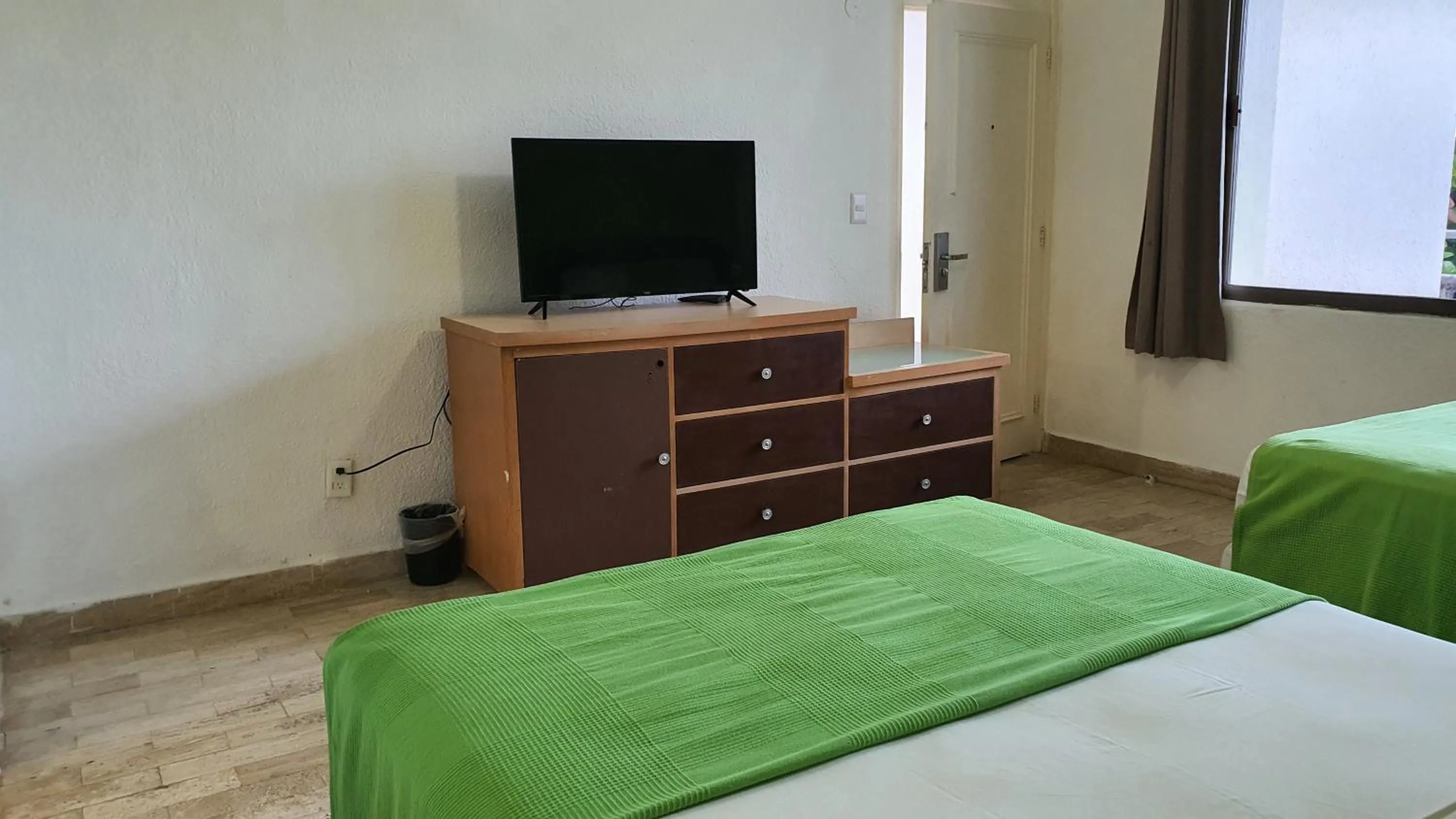 Photo of the whole room, Bed in Nirvana Hotel - Cancun Hotel Zone