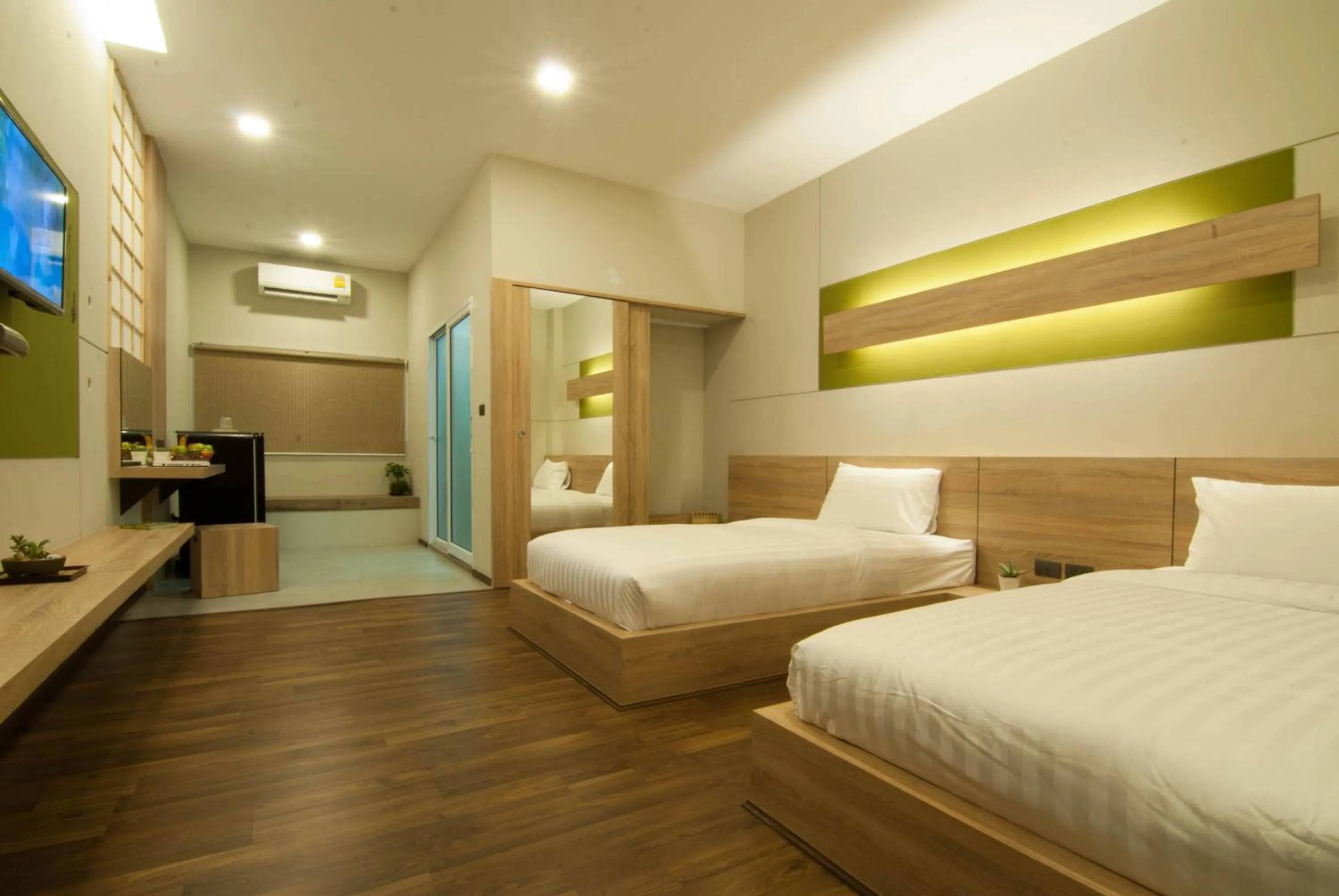 Bed in The Zenith Residence Hotel