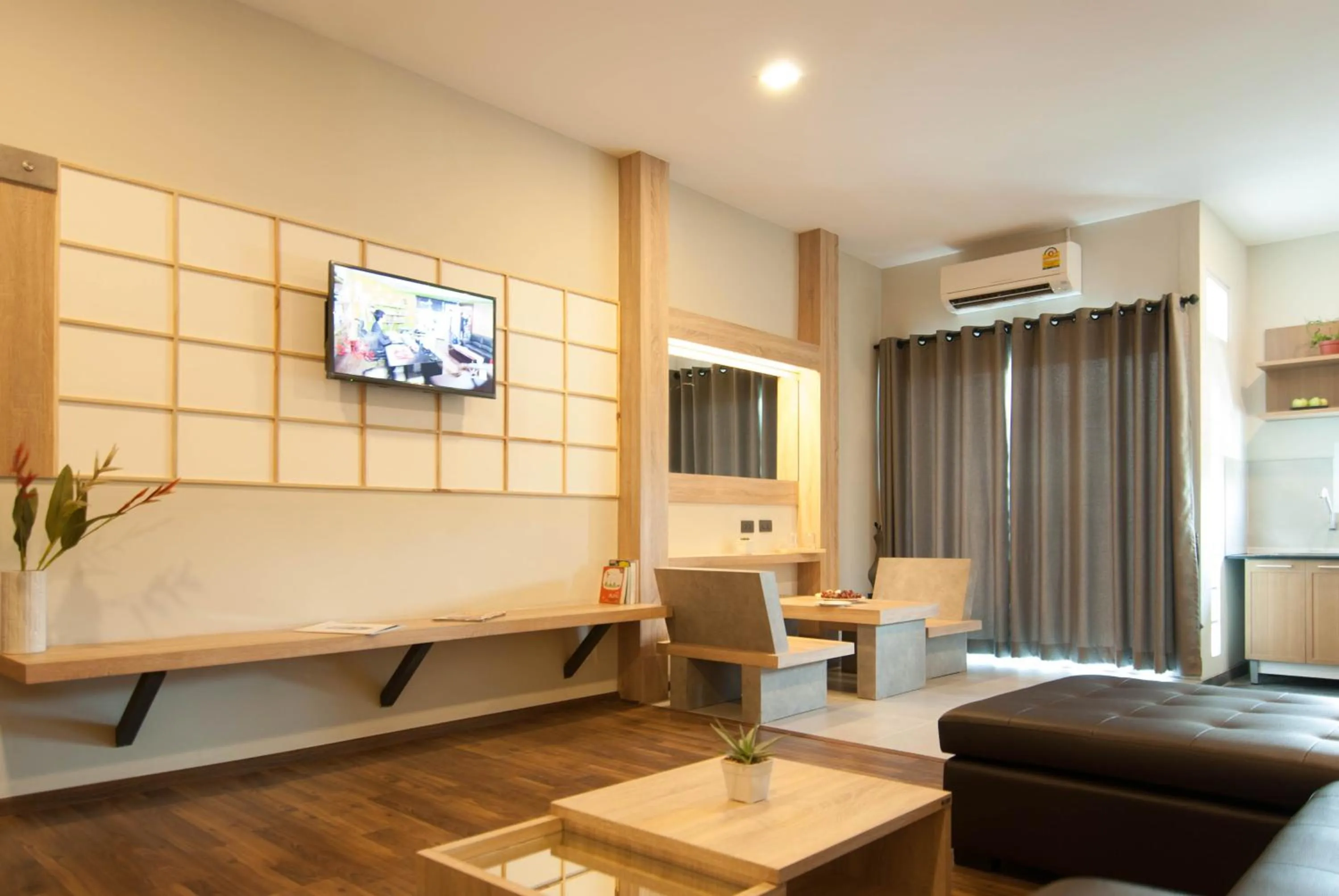 Communal lounge/ TV room in The Zenith Residence Hotel