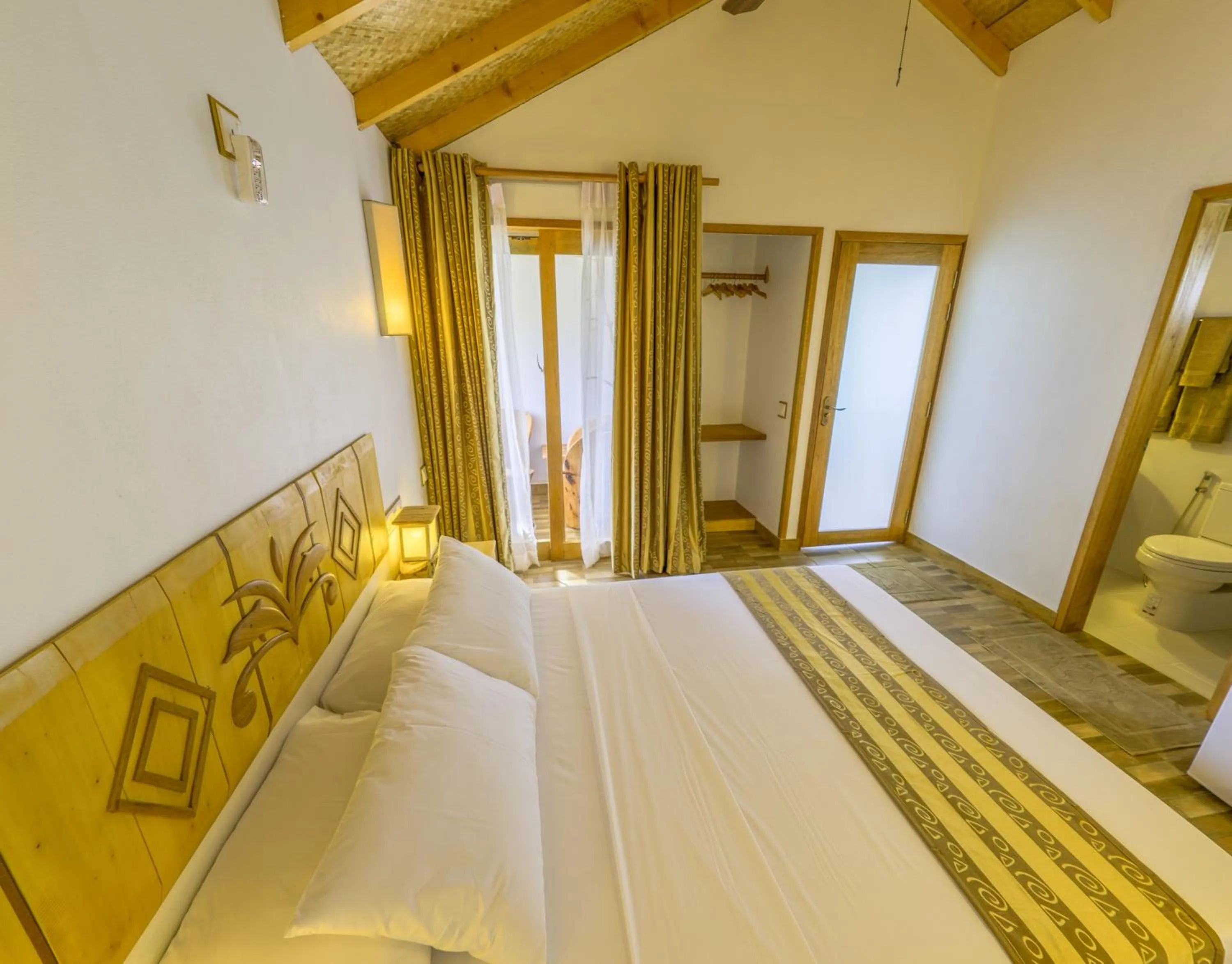 Bed in Ameera Maldives