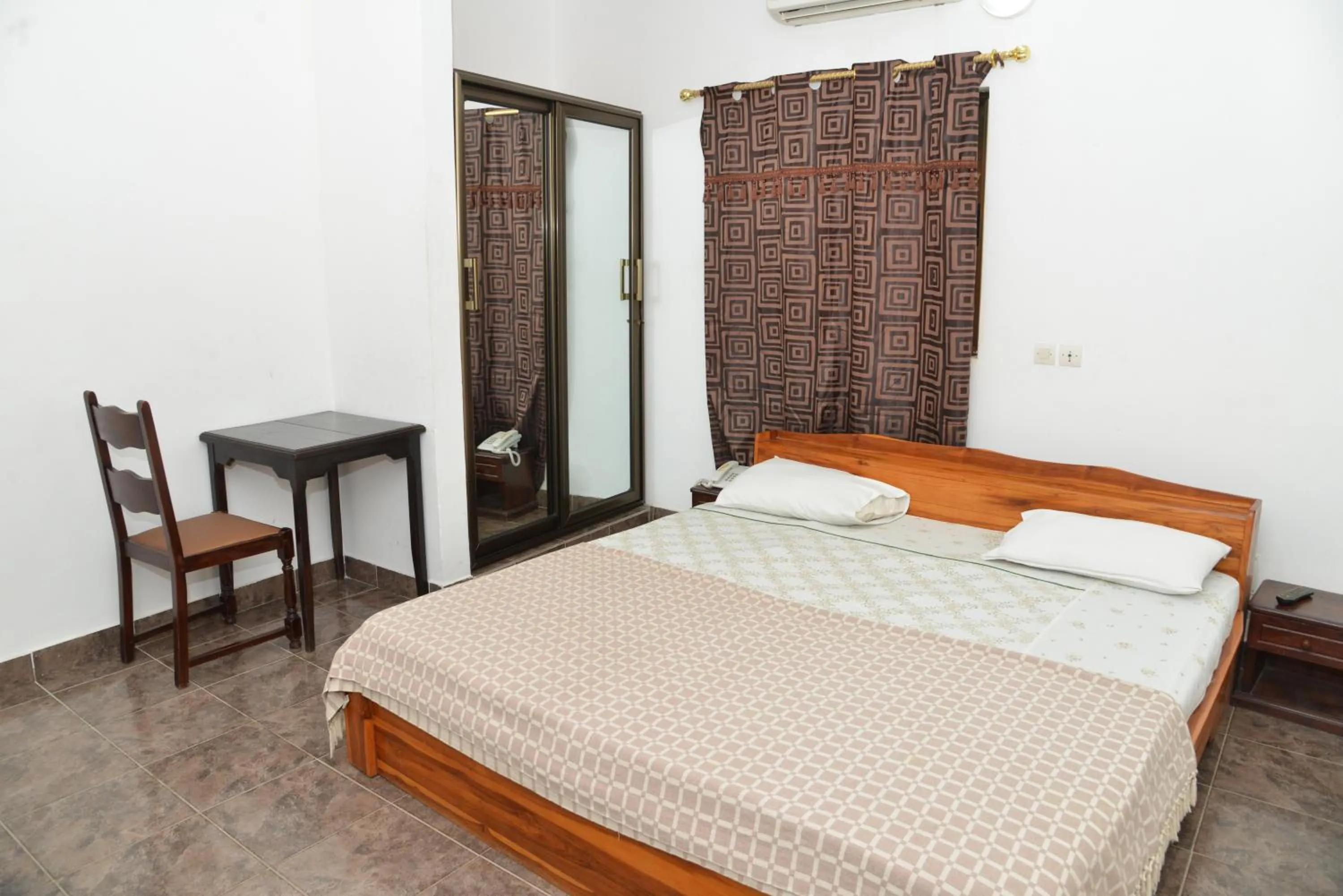 Bedroom in Hotel Residence Lobal