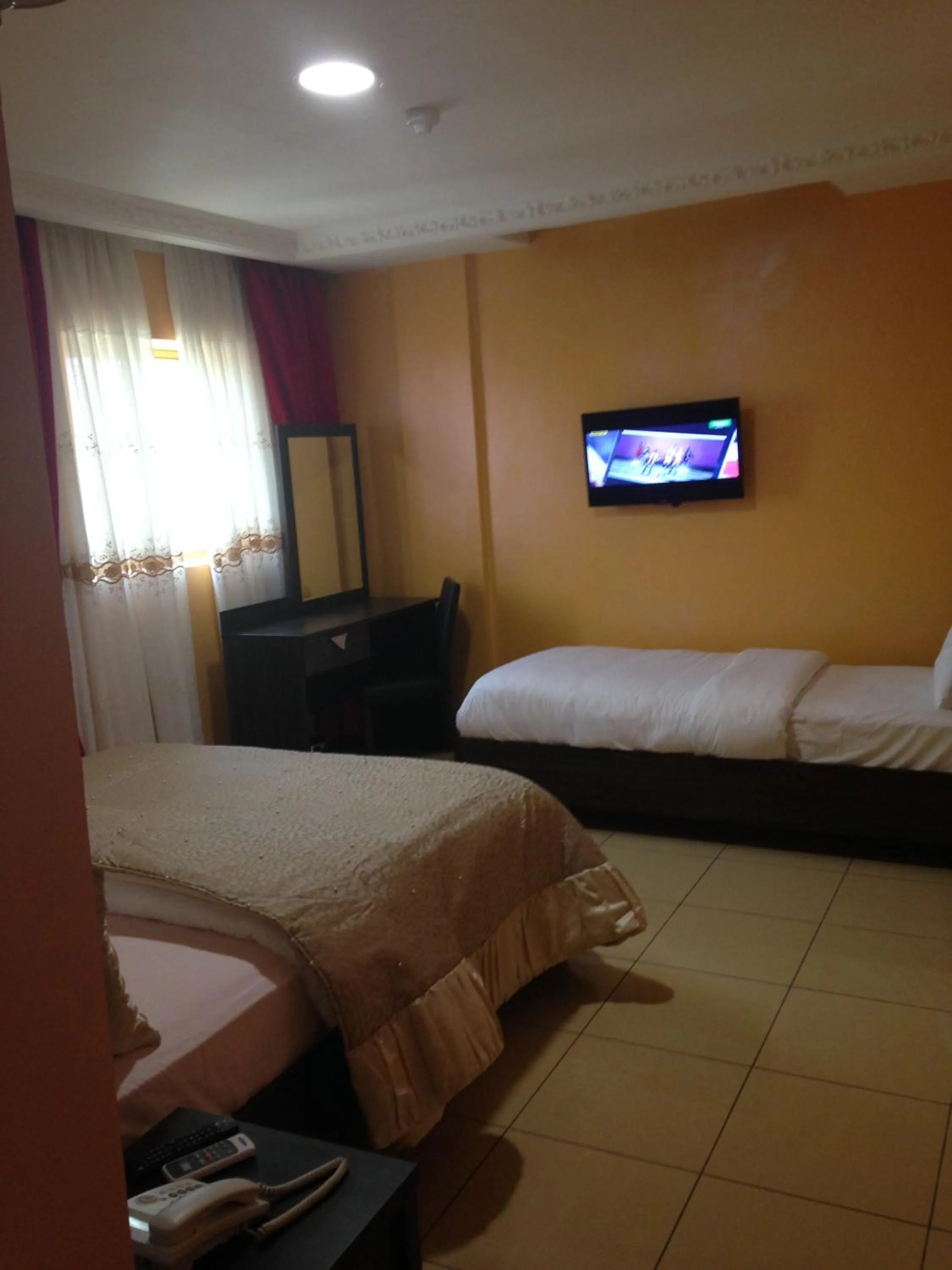 Photo of the whole room in Noubou International Hotel