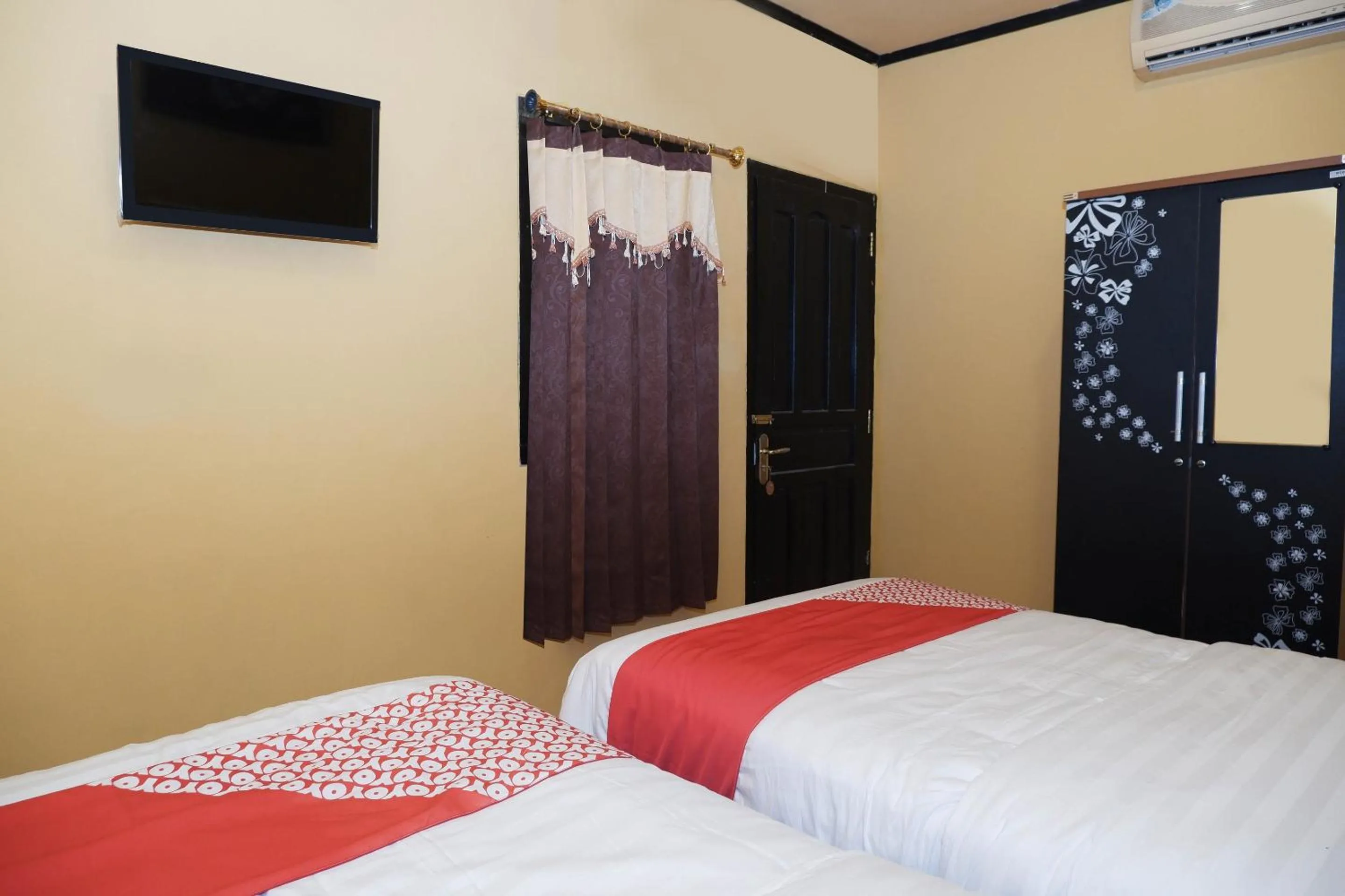 Bedroom in Super OYO 598 Udan Mas Guesthouse& Gallery