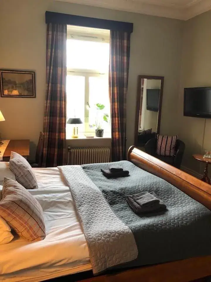 Family Suite with River View in Strand Hotel Family Suite with River View in Strand Hotel