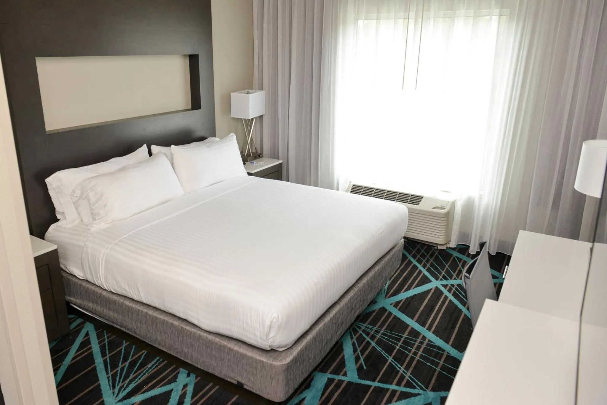 Photo of the whole room, Bed in Holiday Inn Express & Suites - Charlotte Airport by IHG